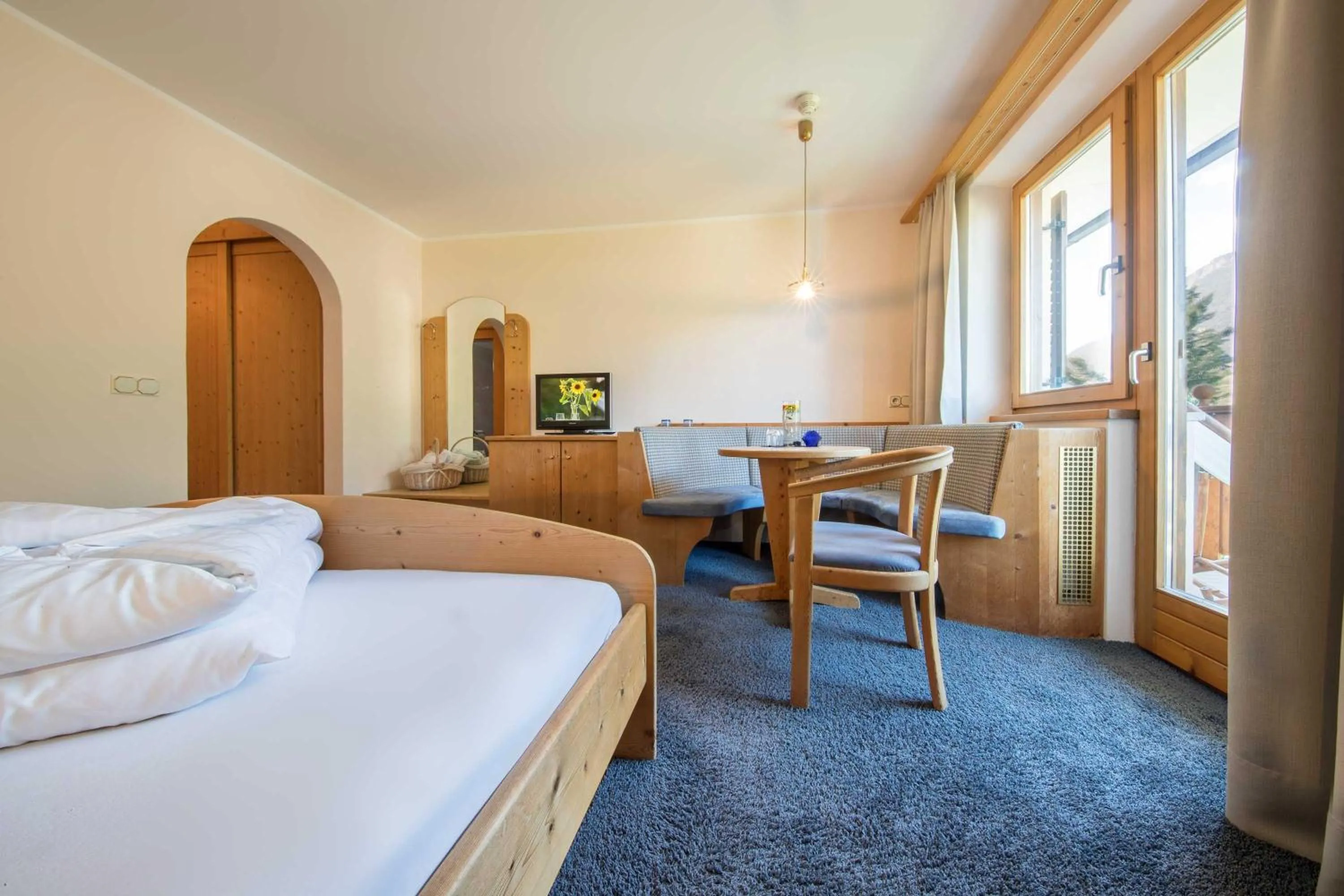 Seating area, Bed in Hotel Weingarten