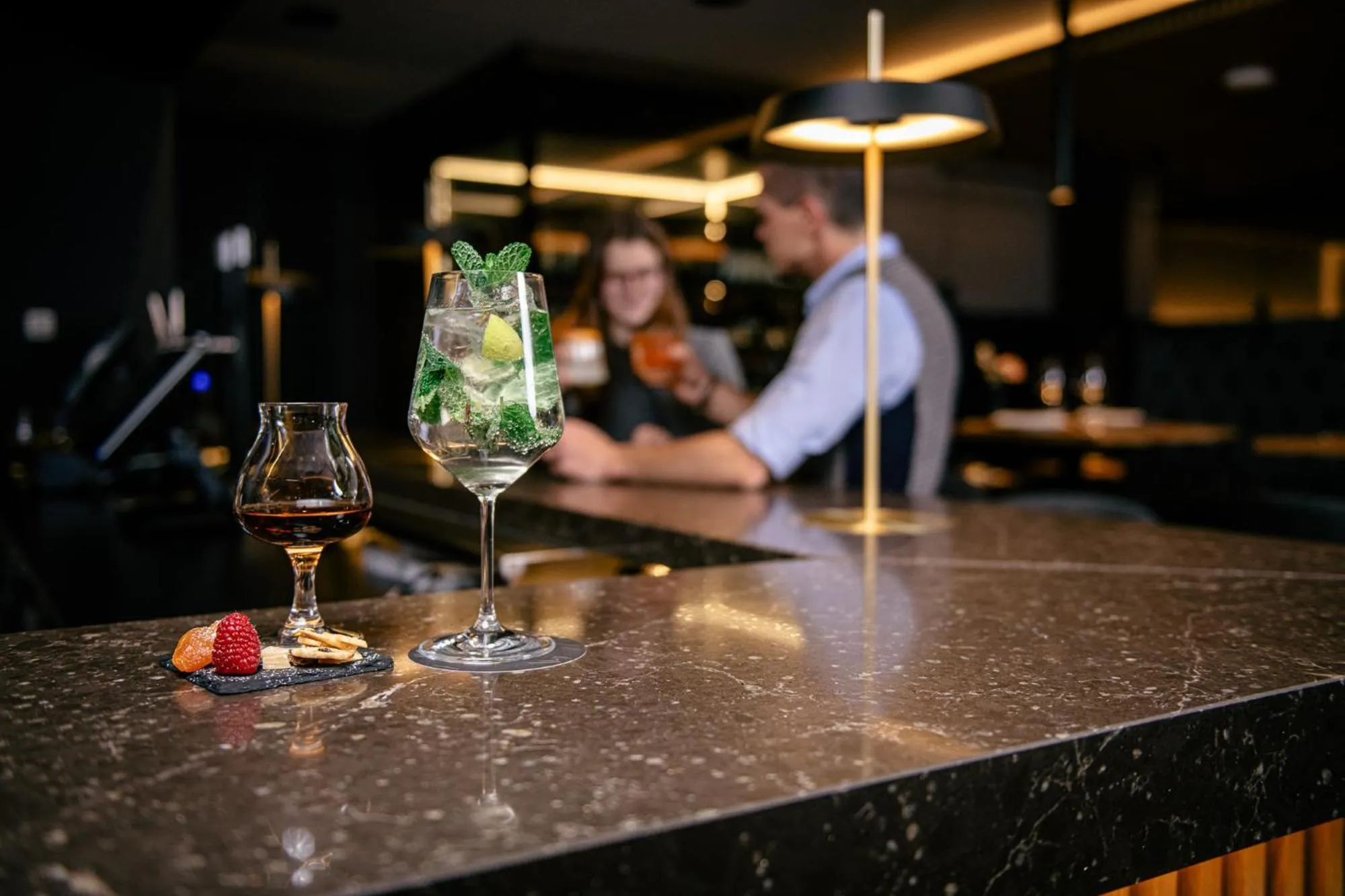 Lounge or bar in HOTEL POST alpine cityflair