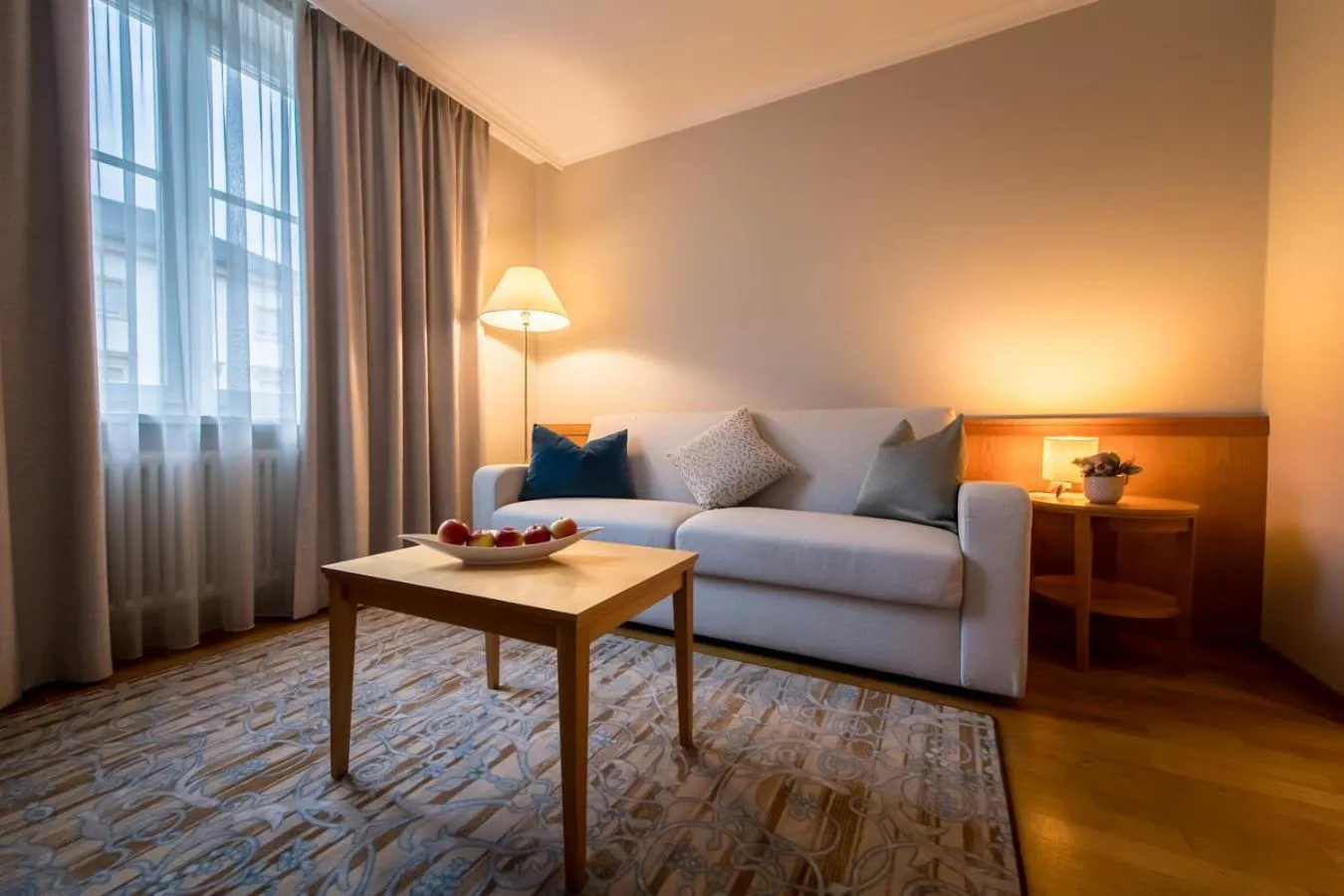 Seating area, Bed in HOTEL POST alpine cityflair