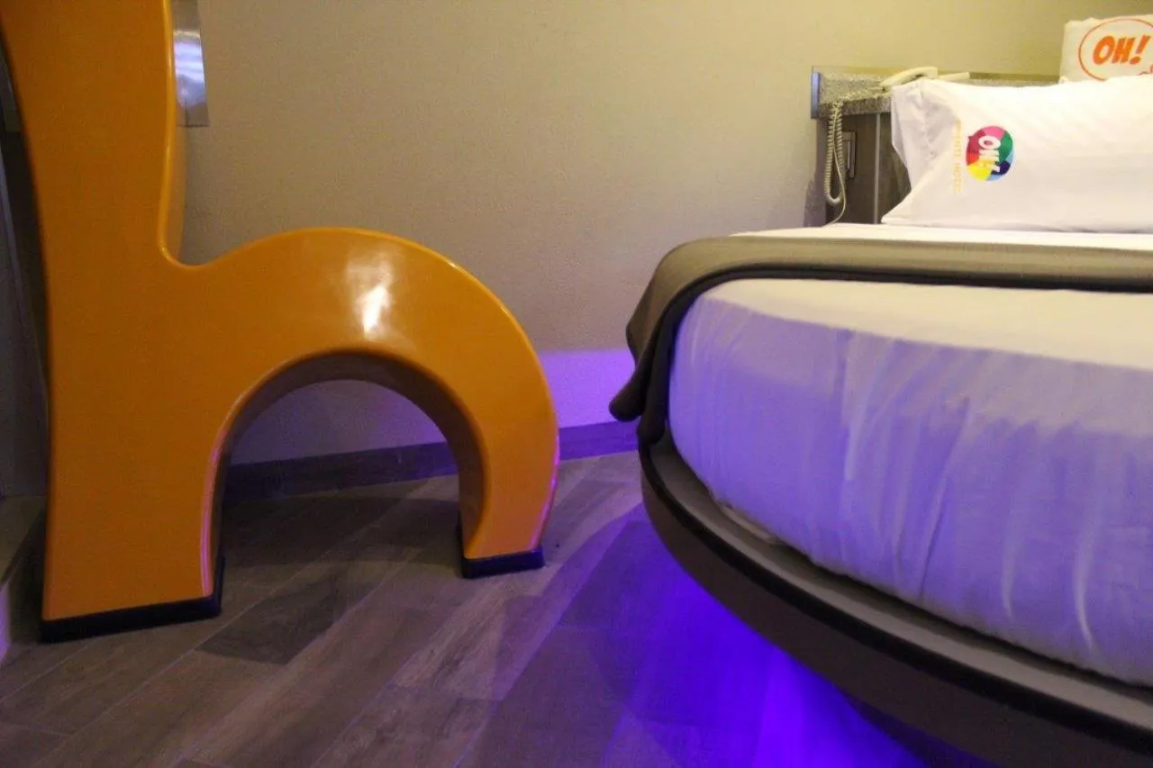 Bed in Oh! Oriente Hotel