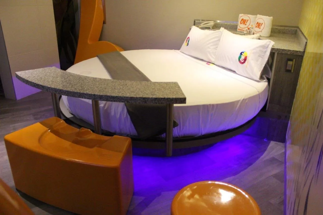 Bed in Oh! Oriente Hotel