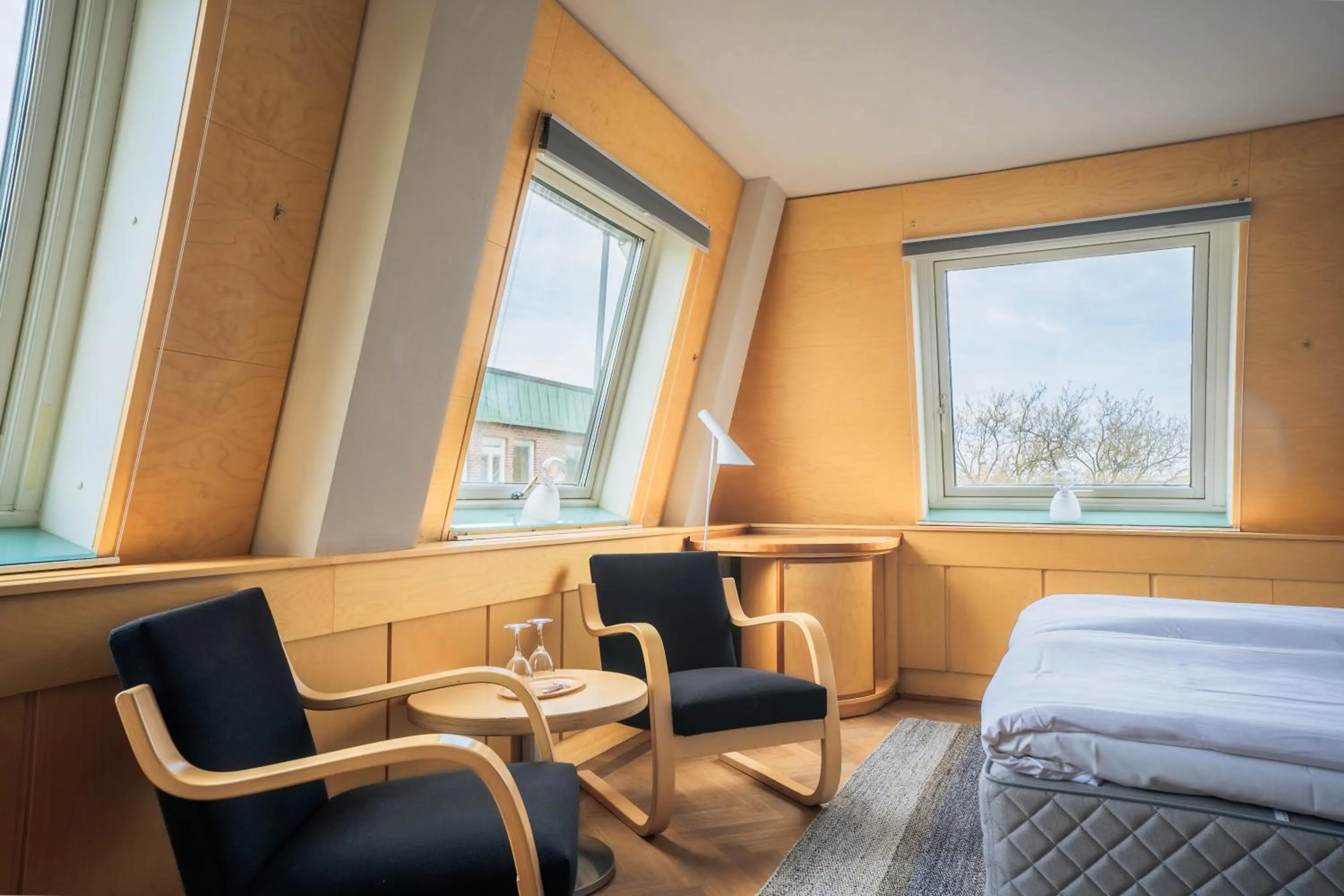 Seating area, Bed in Hotel Lundia
