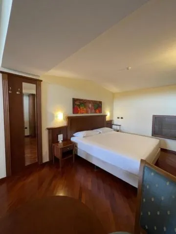 Bed in Hotel Villa Venus Resort & SPA