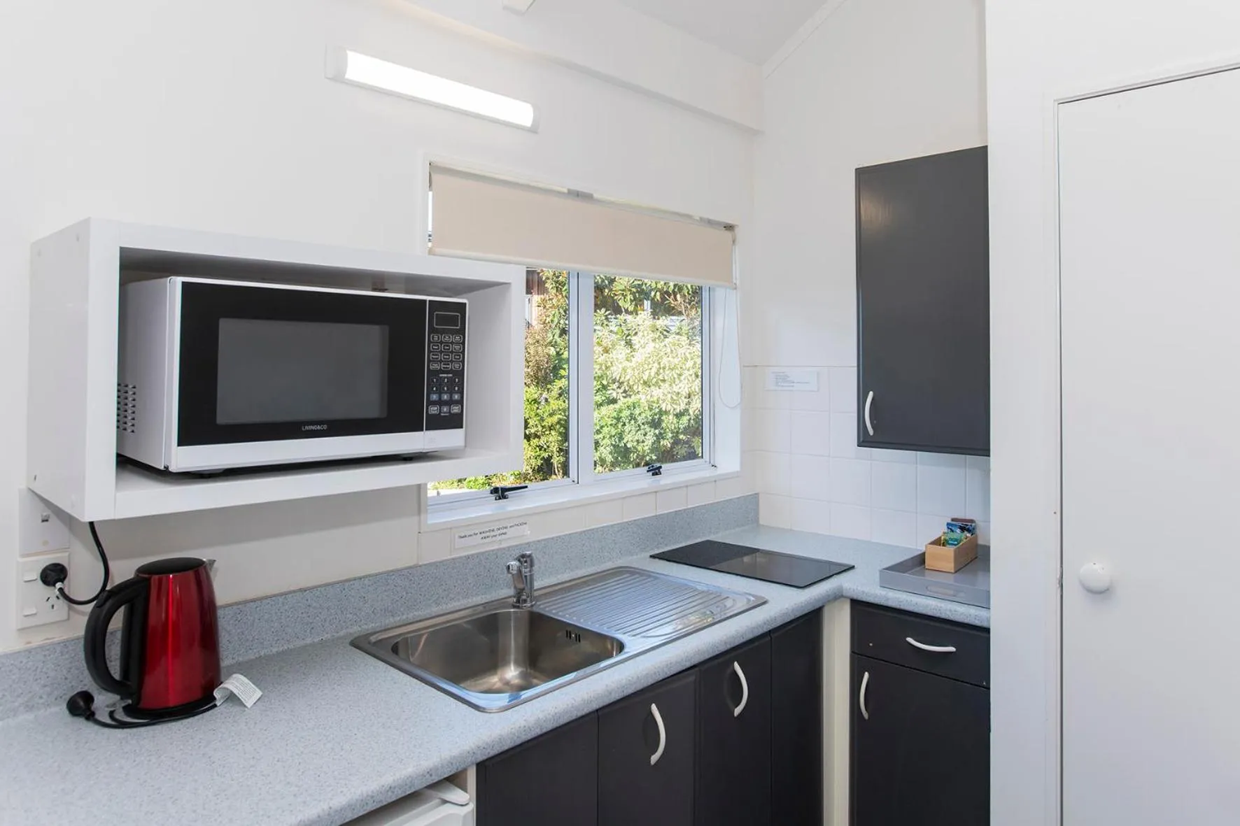 Kitchen or kitchenette in Ohope Beach Motel
