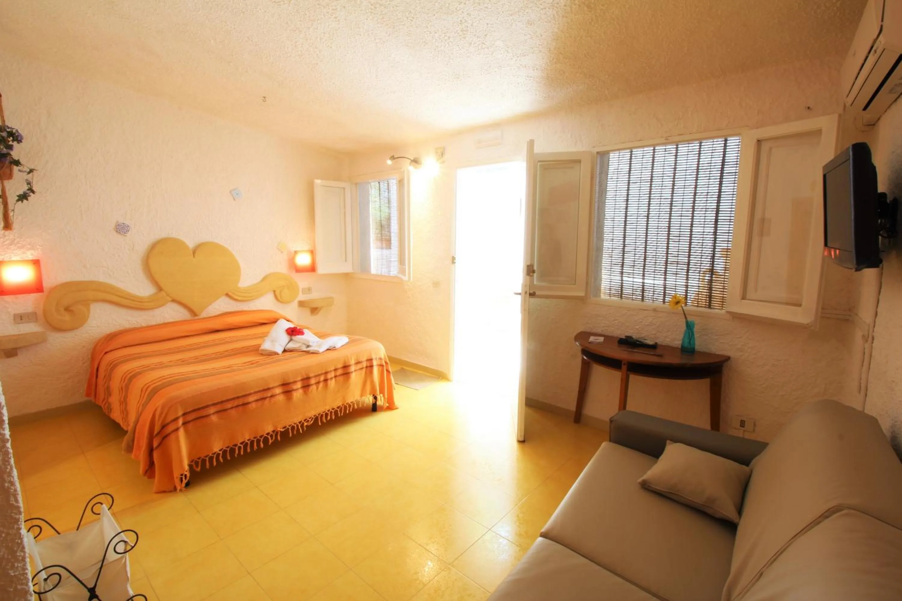 Photo of the whole room in L'Oasi Villaggio Albergo