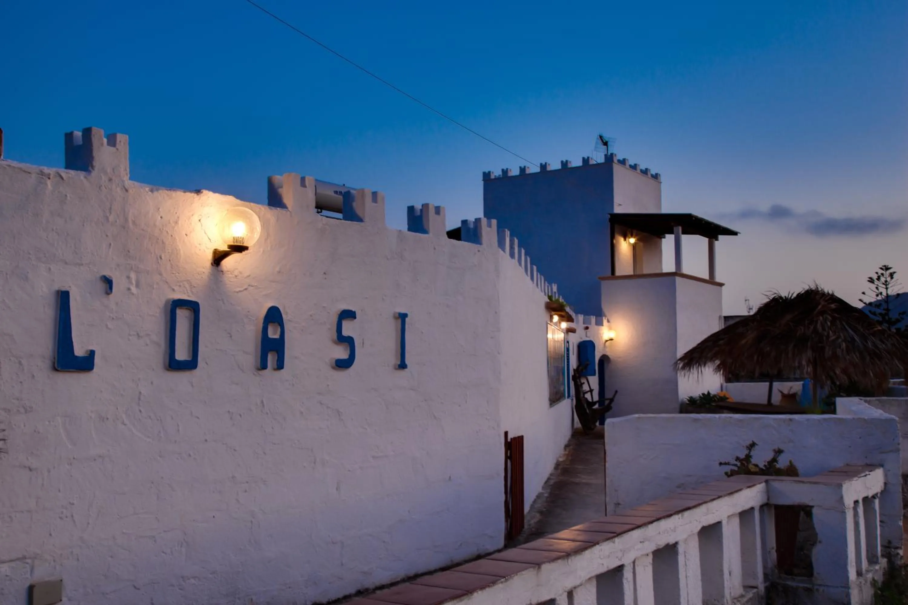 Property logo or sign in L'Oasi Villaggio Albergo