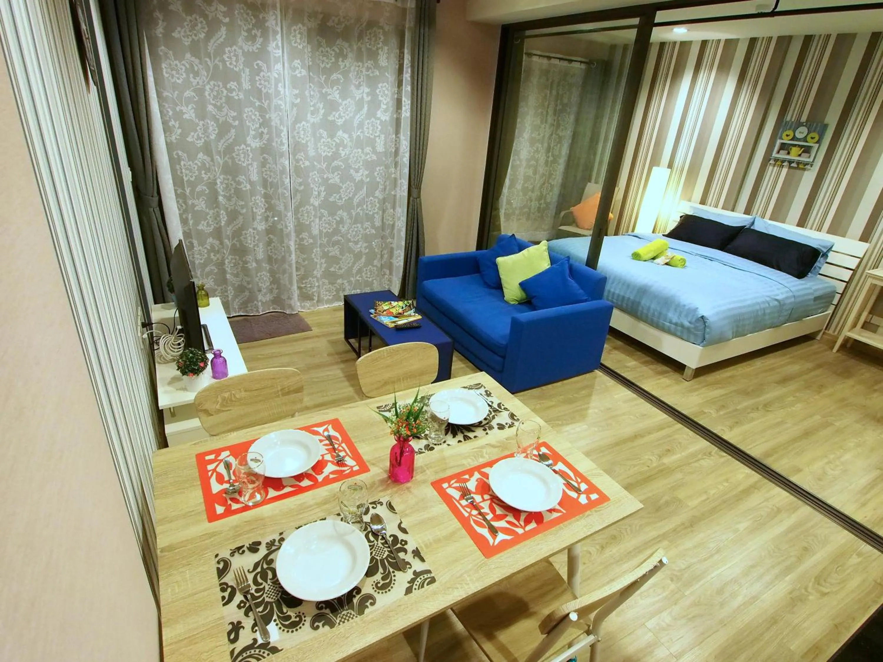 Bed in Rain by Lazy Sea Beach House