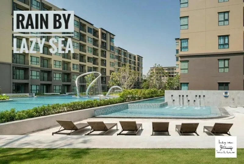 Swimming pool in Rain by Lazy Sea Beach House