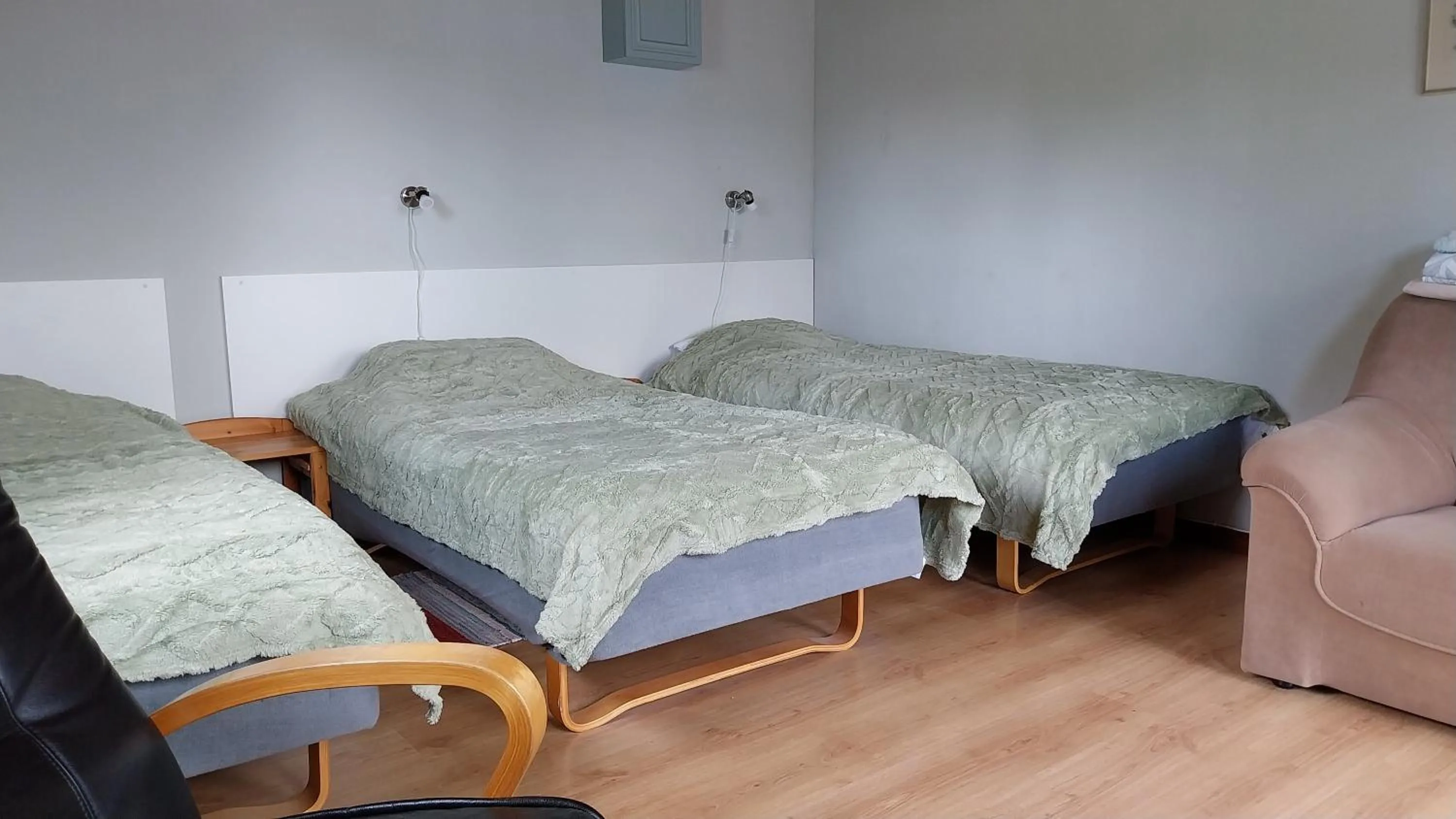 Bed in Lillvikens Gästhuset och Stugor