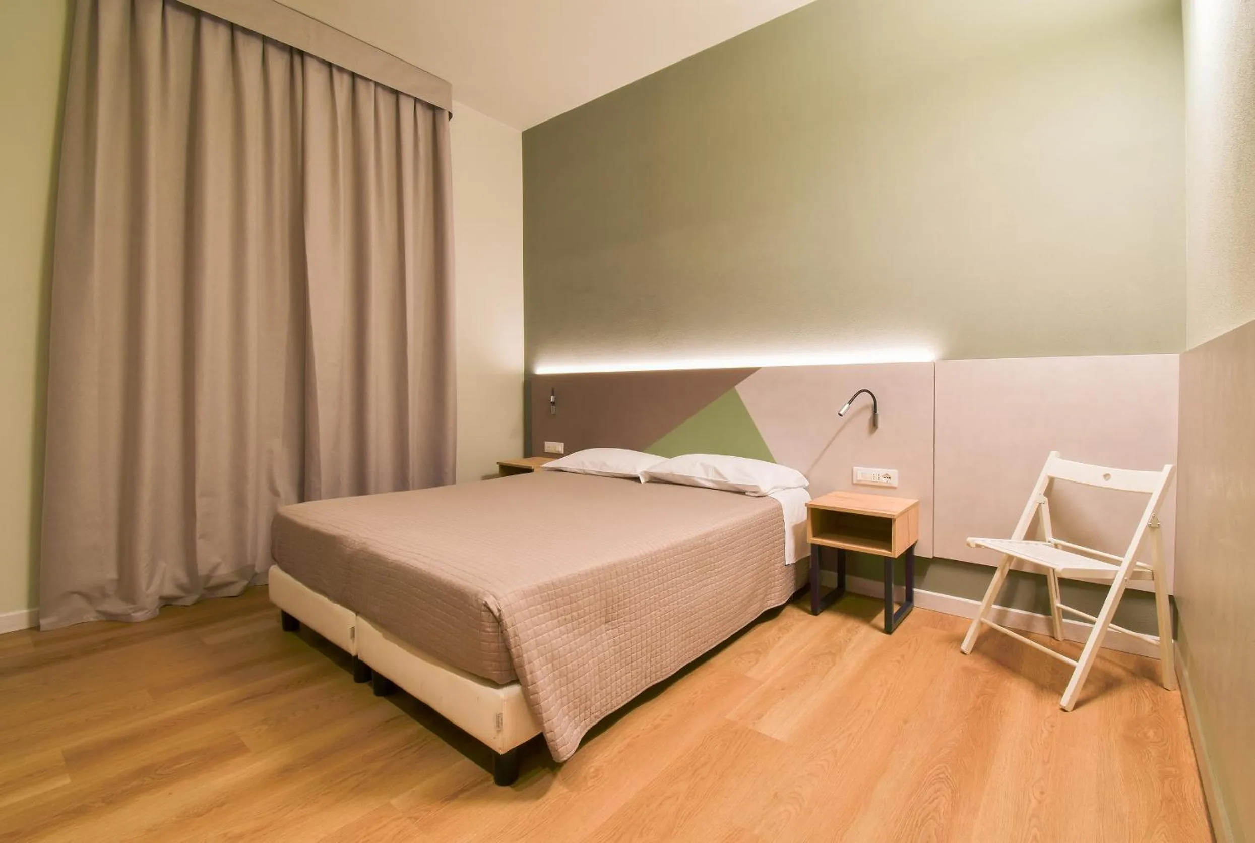 Bed in Hotel Columbia