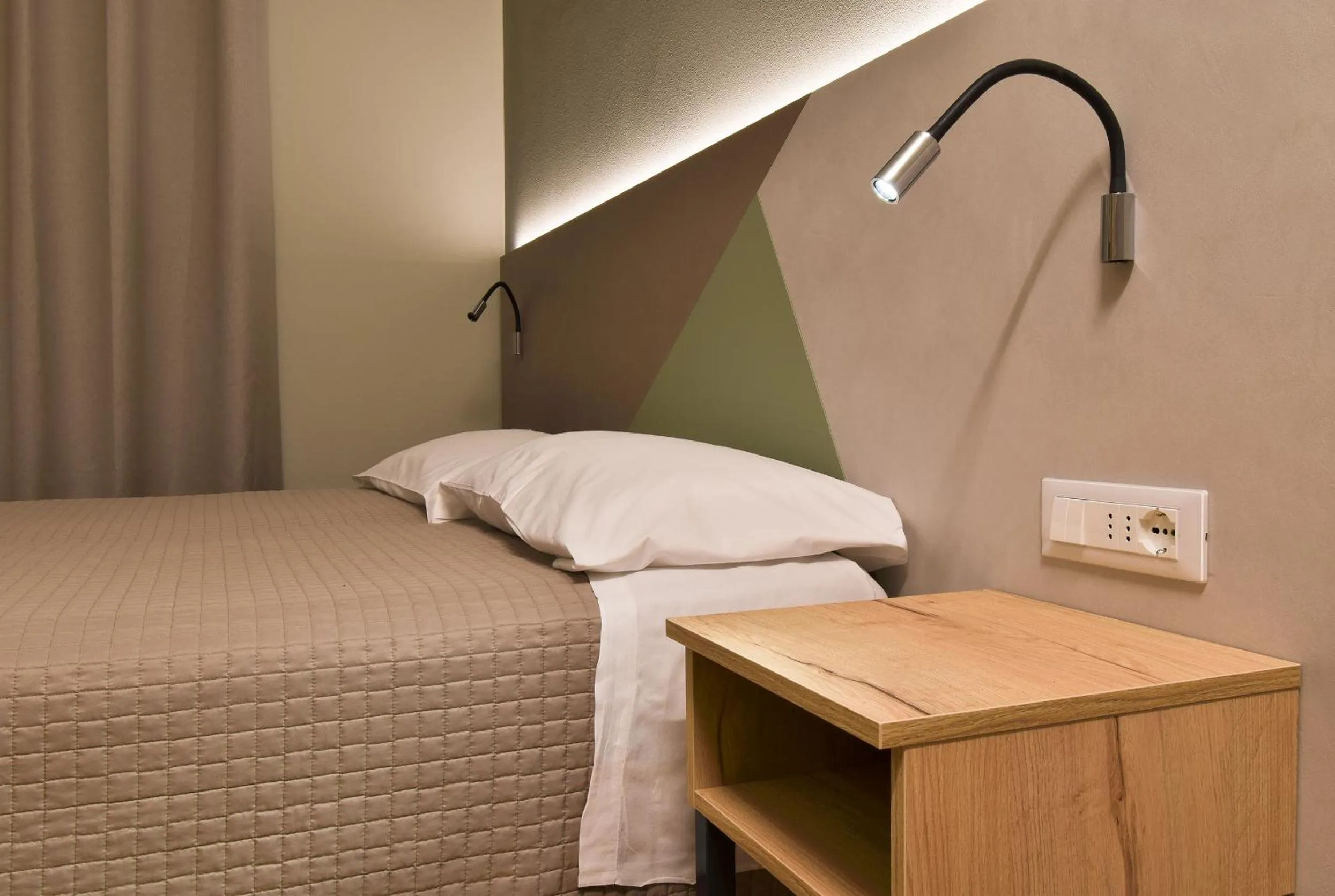 Bed in Hotel Columbia