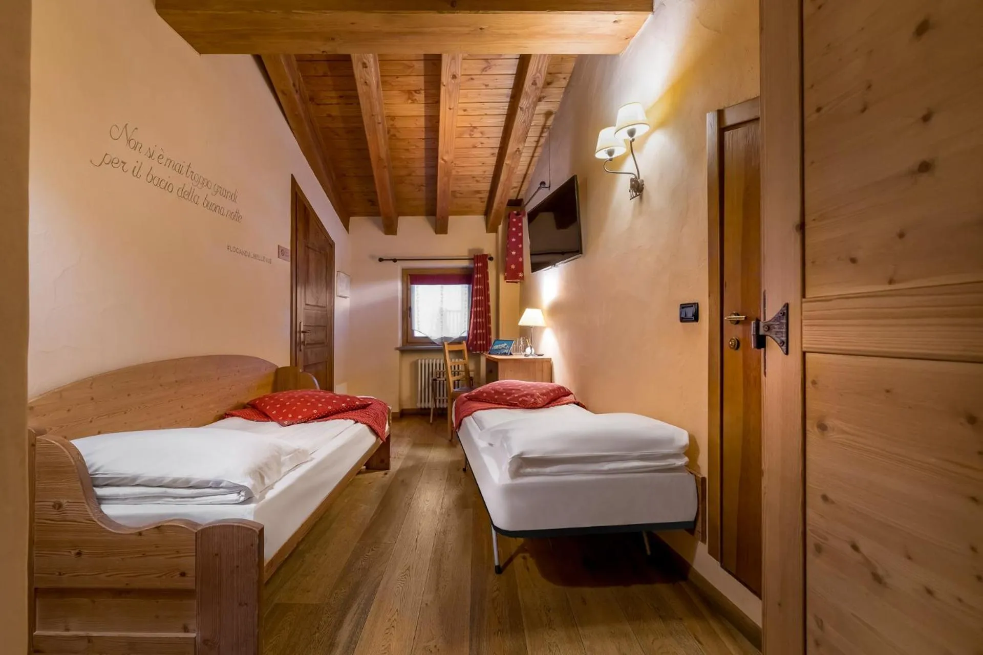 Photo of the whole room, Bed in Locanda Bellevue