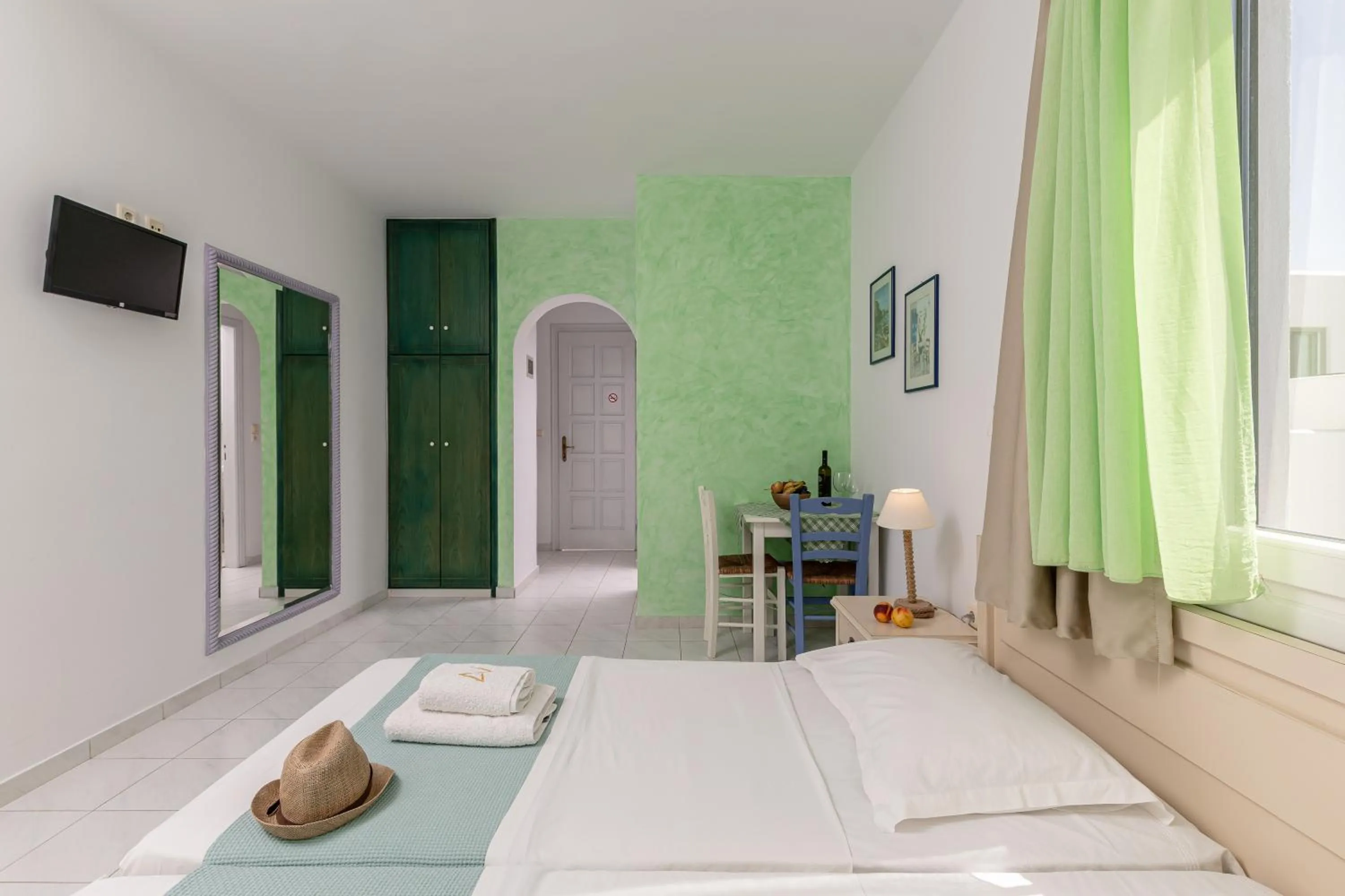 Bed in Annita's Village Hotel