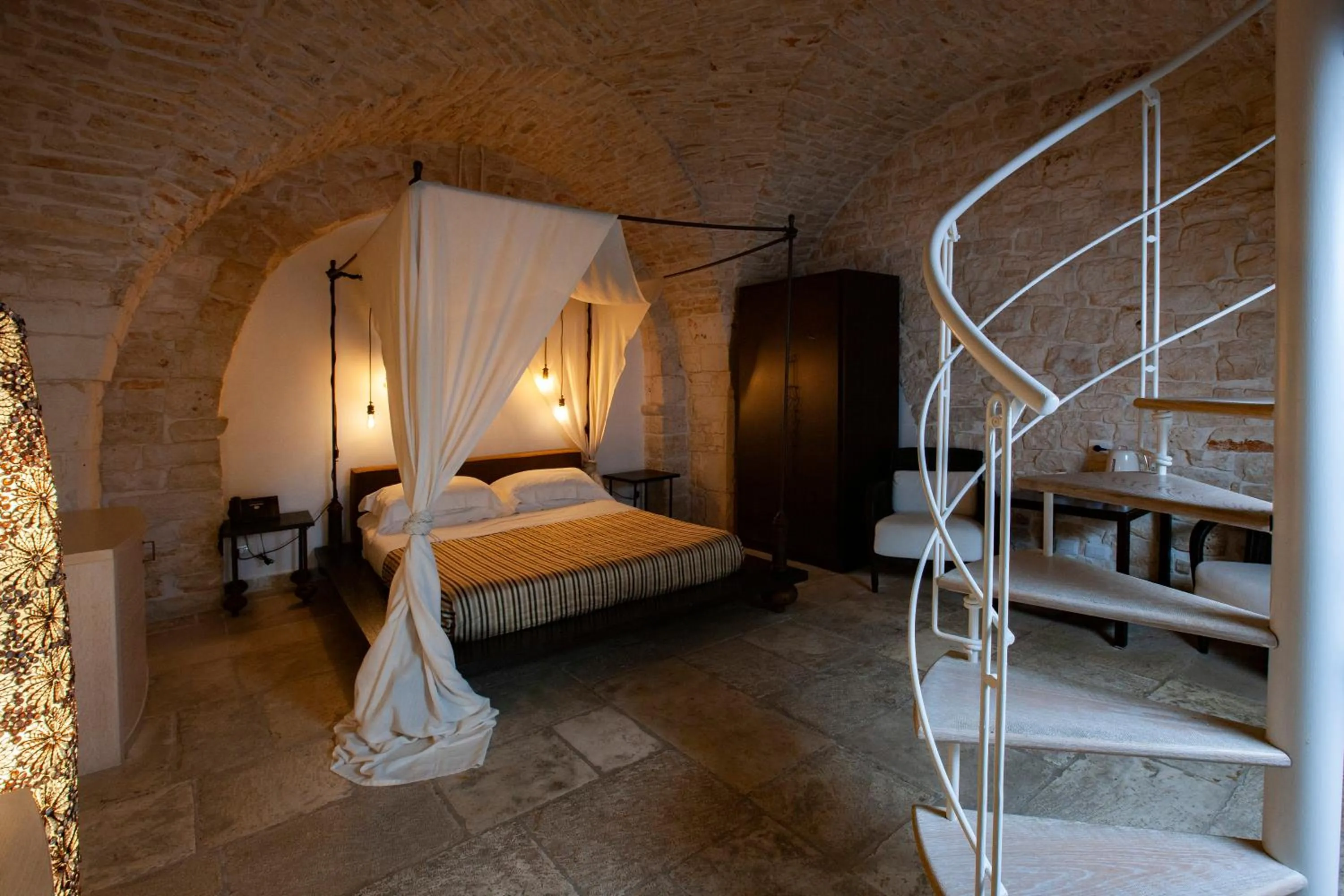 Bed in Le Alcove - Luxury Hotel nei Trulli
