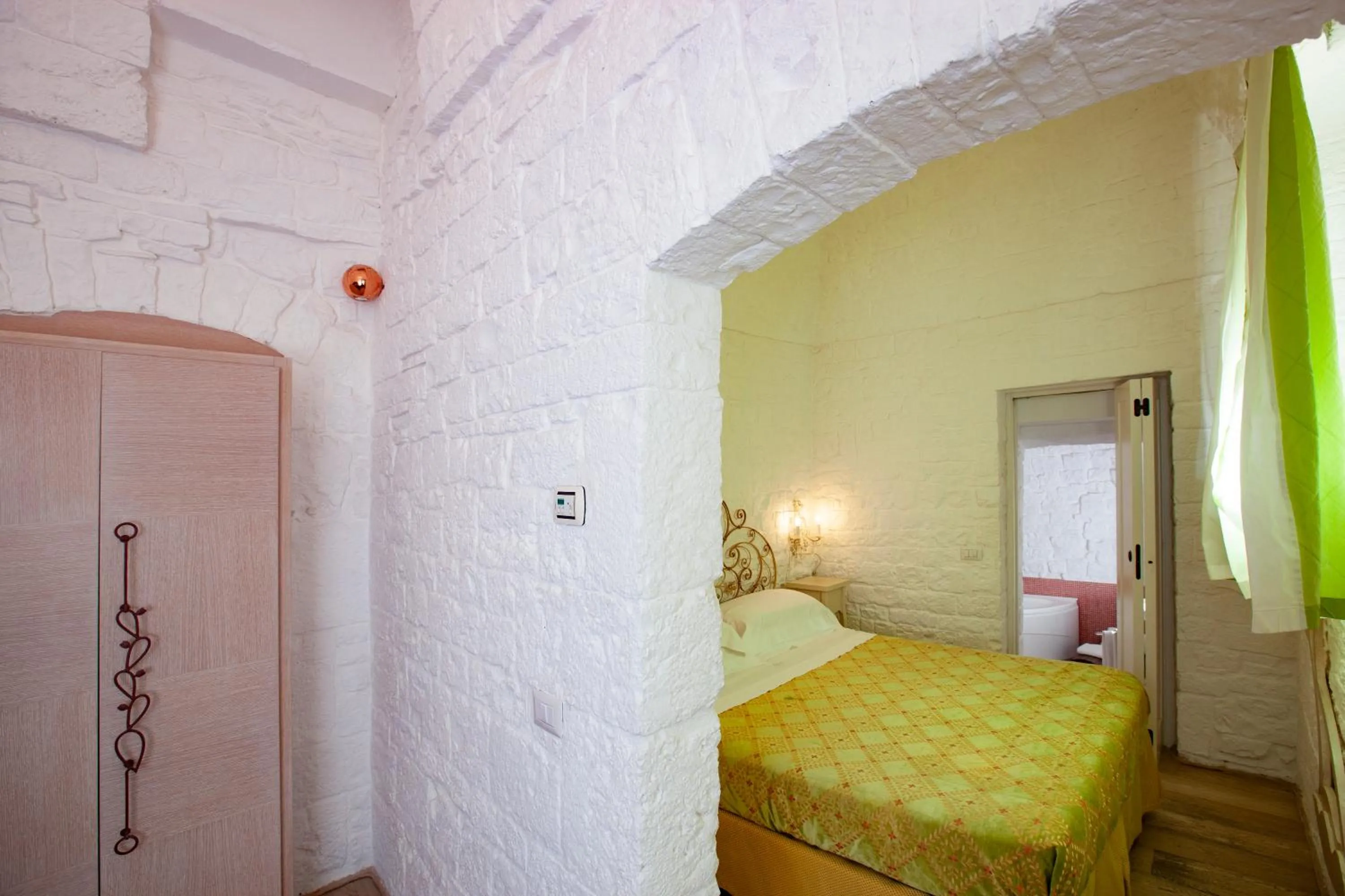 Bed in Le Alcove - Luxury Hotel nei Trulli