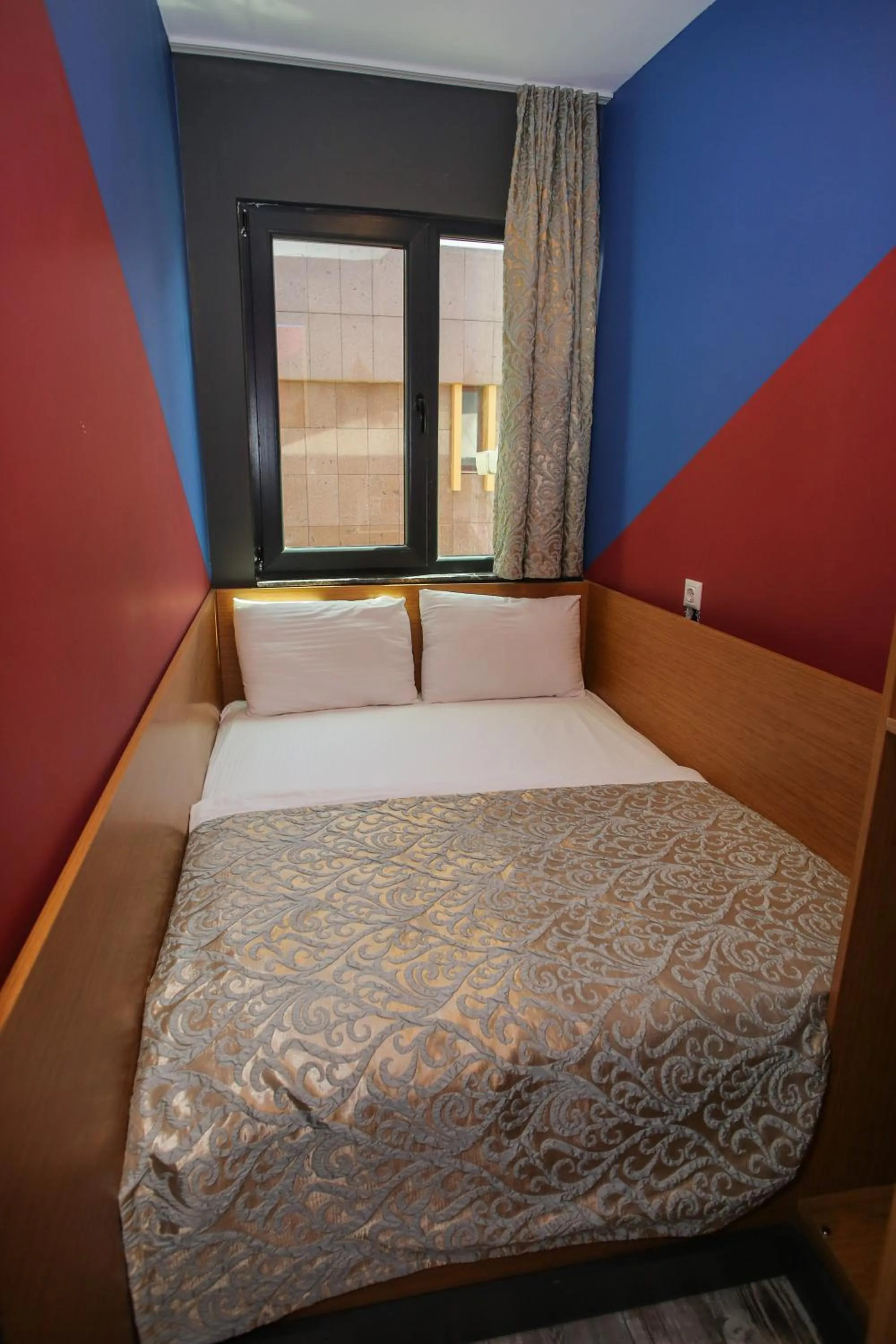 Bed in Quantum Hotel