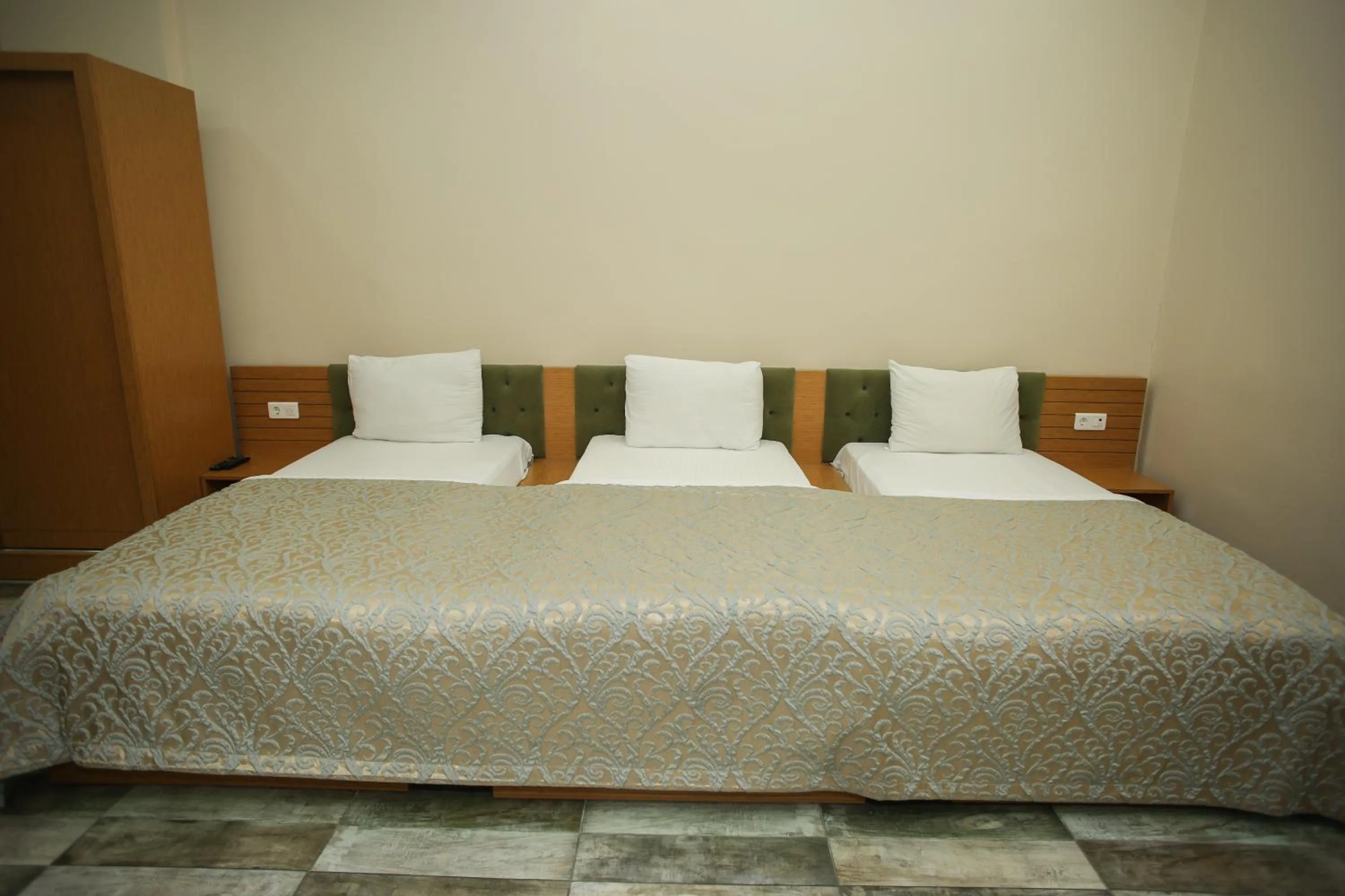 Bed in Quantum Hotel