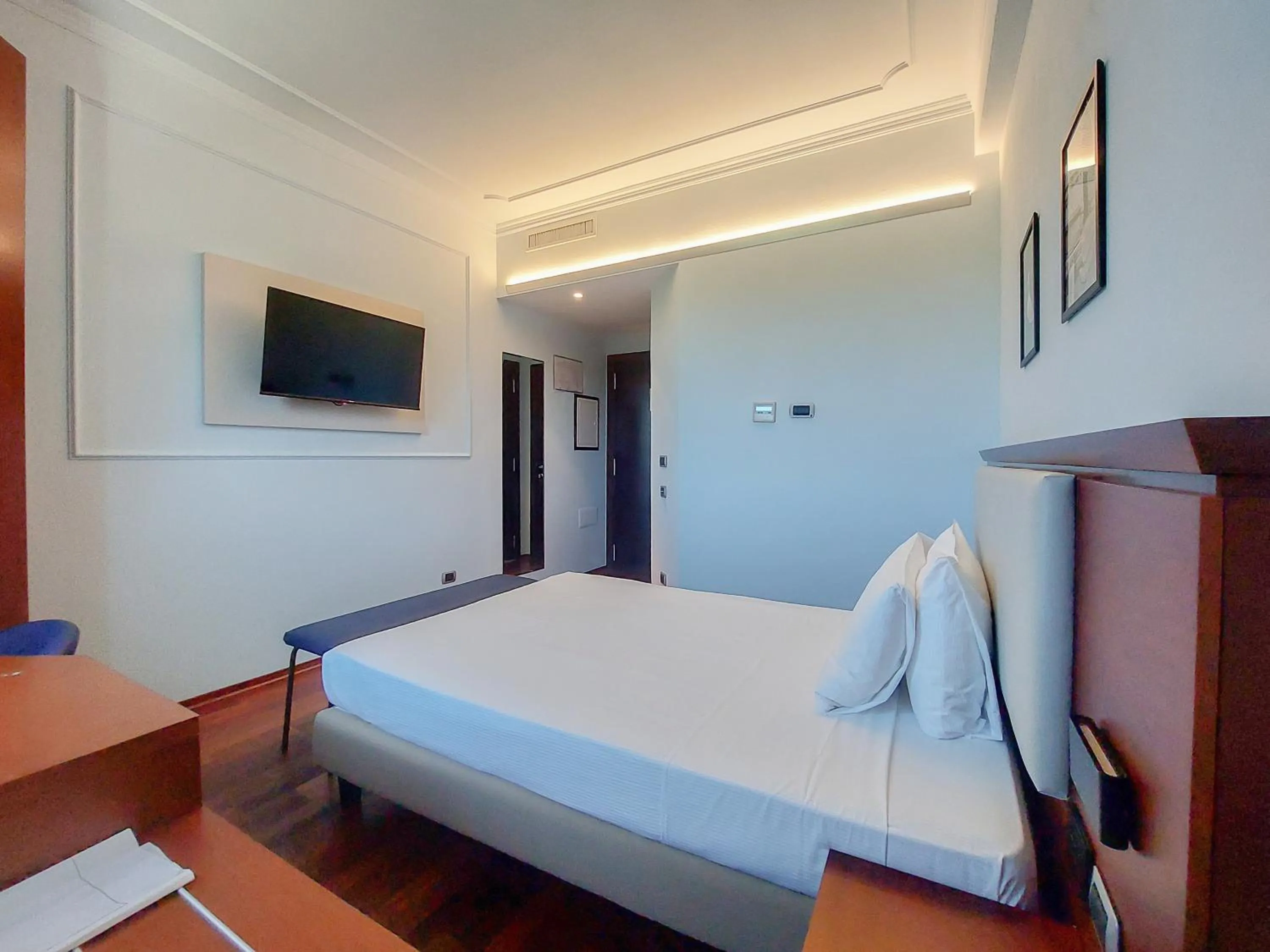 Bed in Dado Hotel International