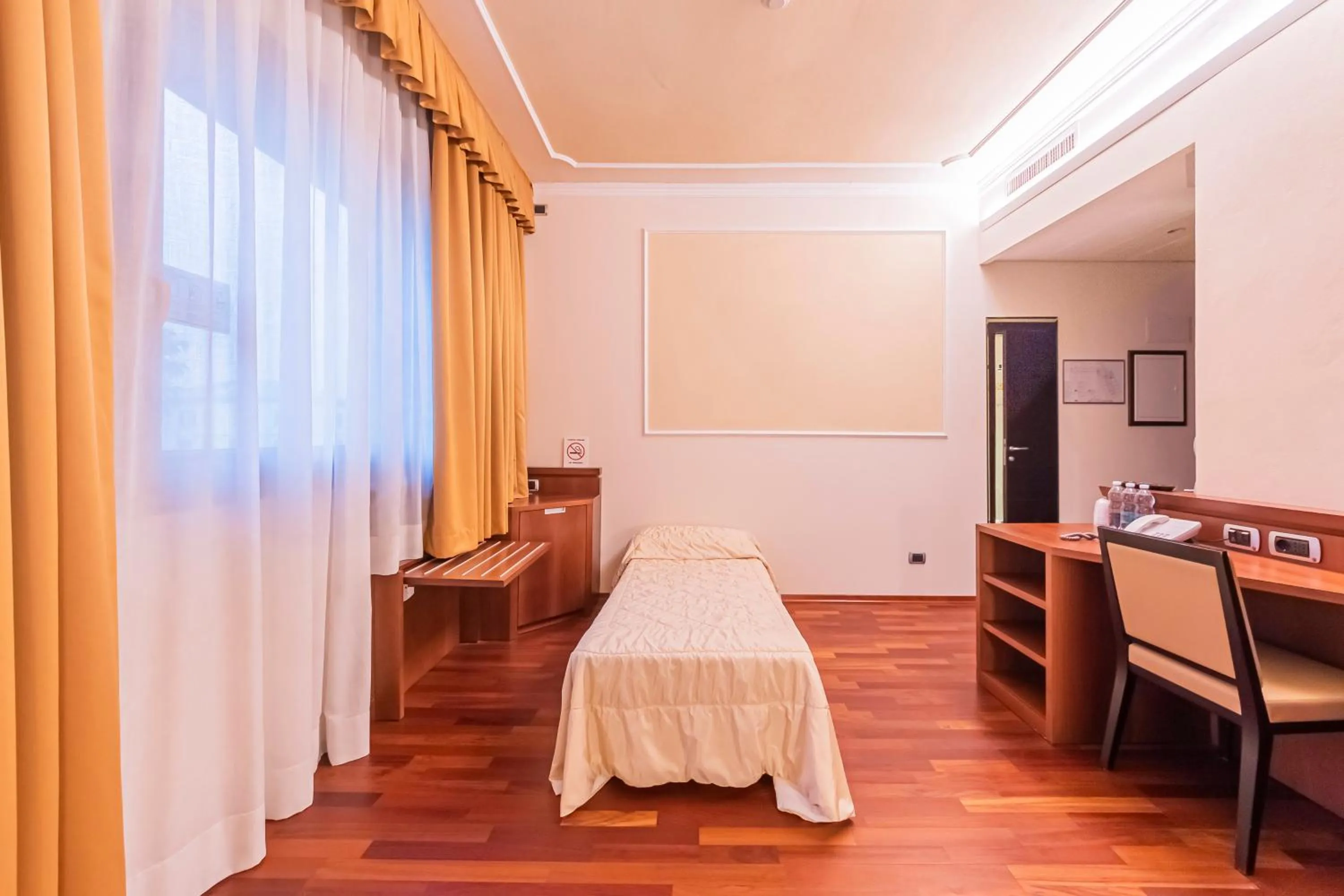 Bed in Dado Hotel International