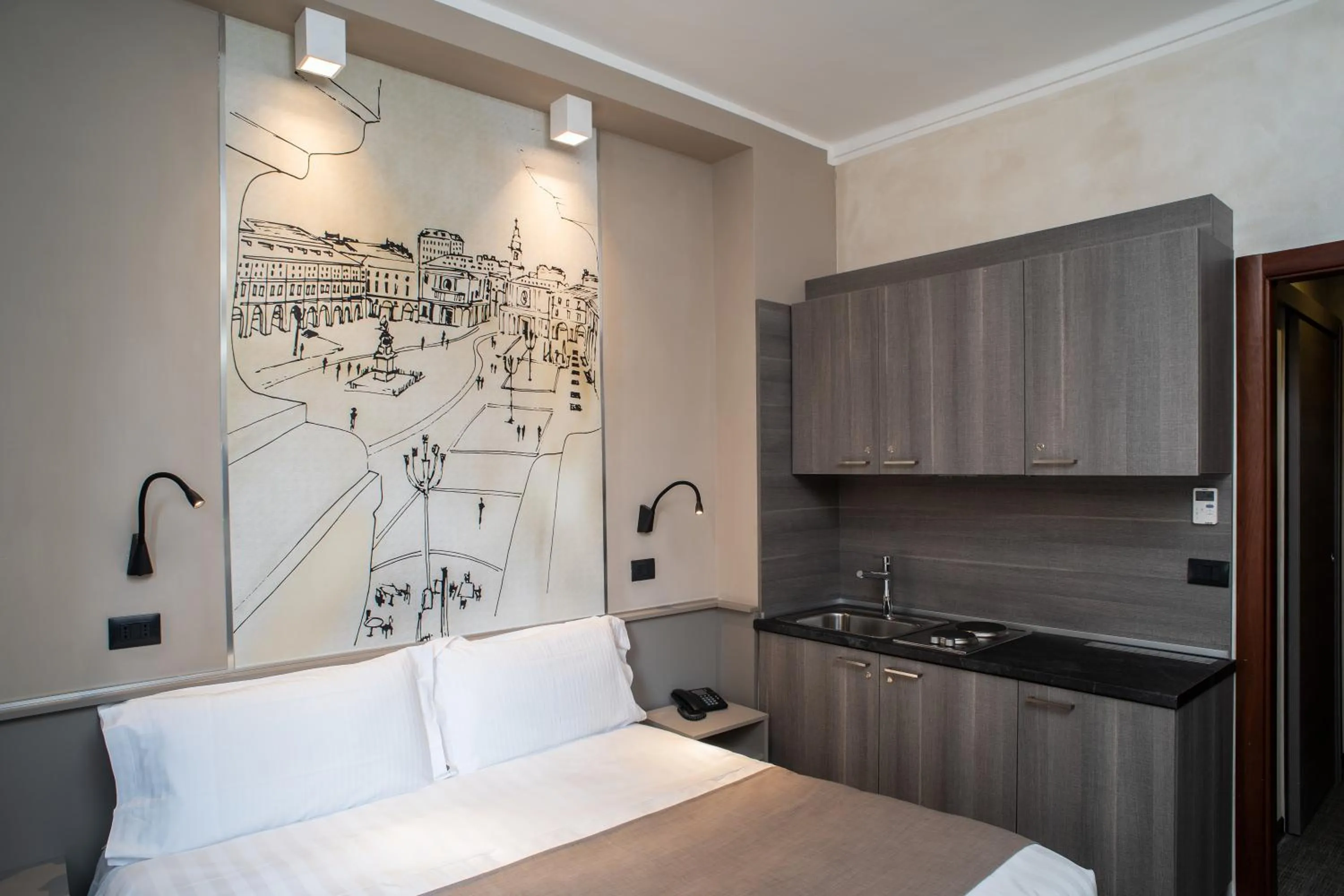 Kitchen or kitchenette, Bed in Hotel Plaza