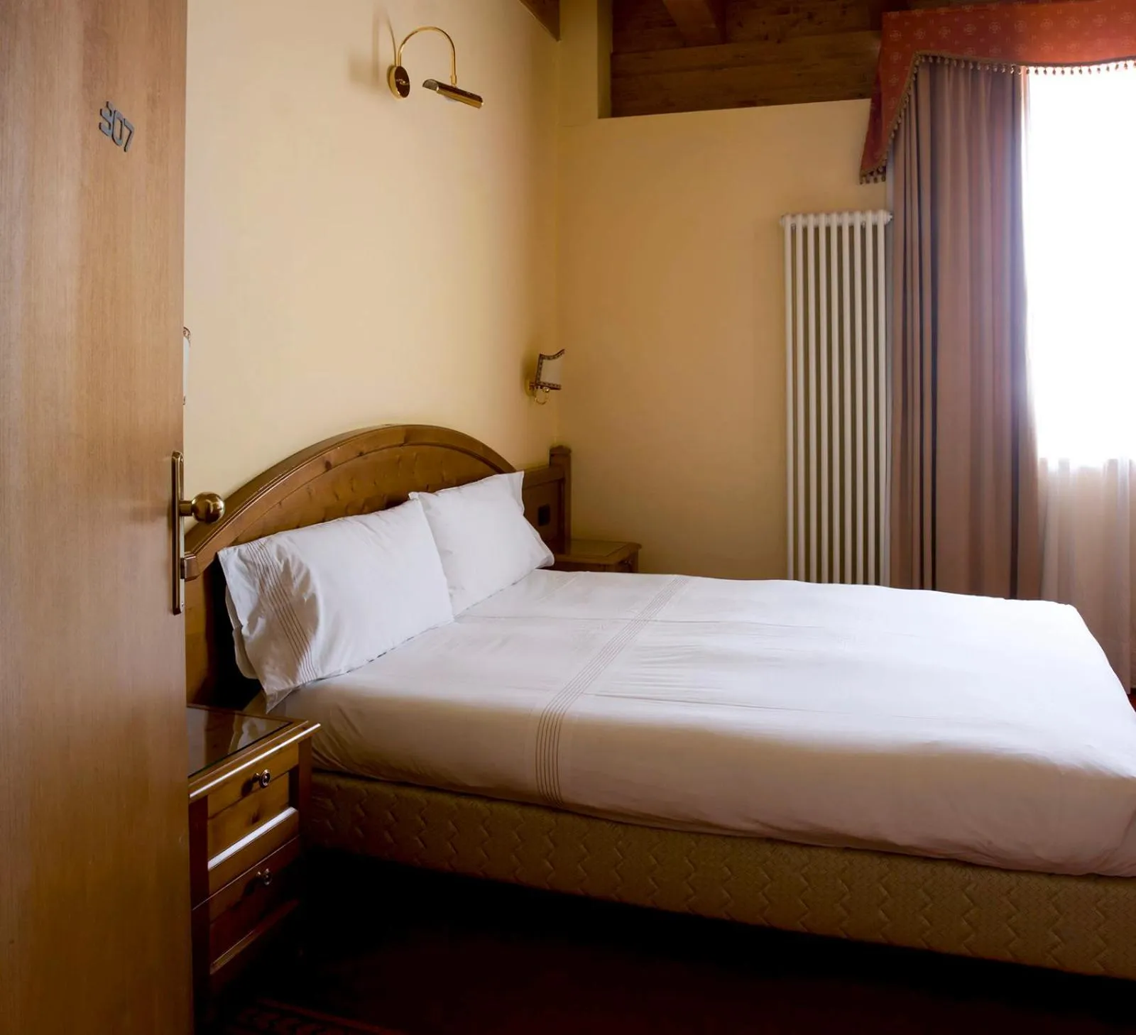 Bed in Grand Hotel Paradiso