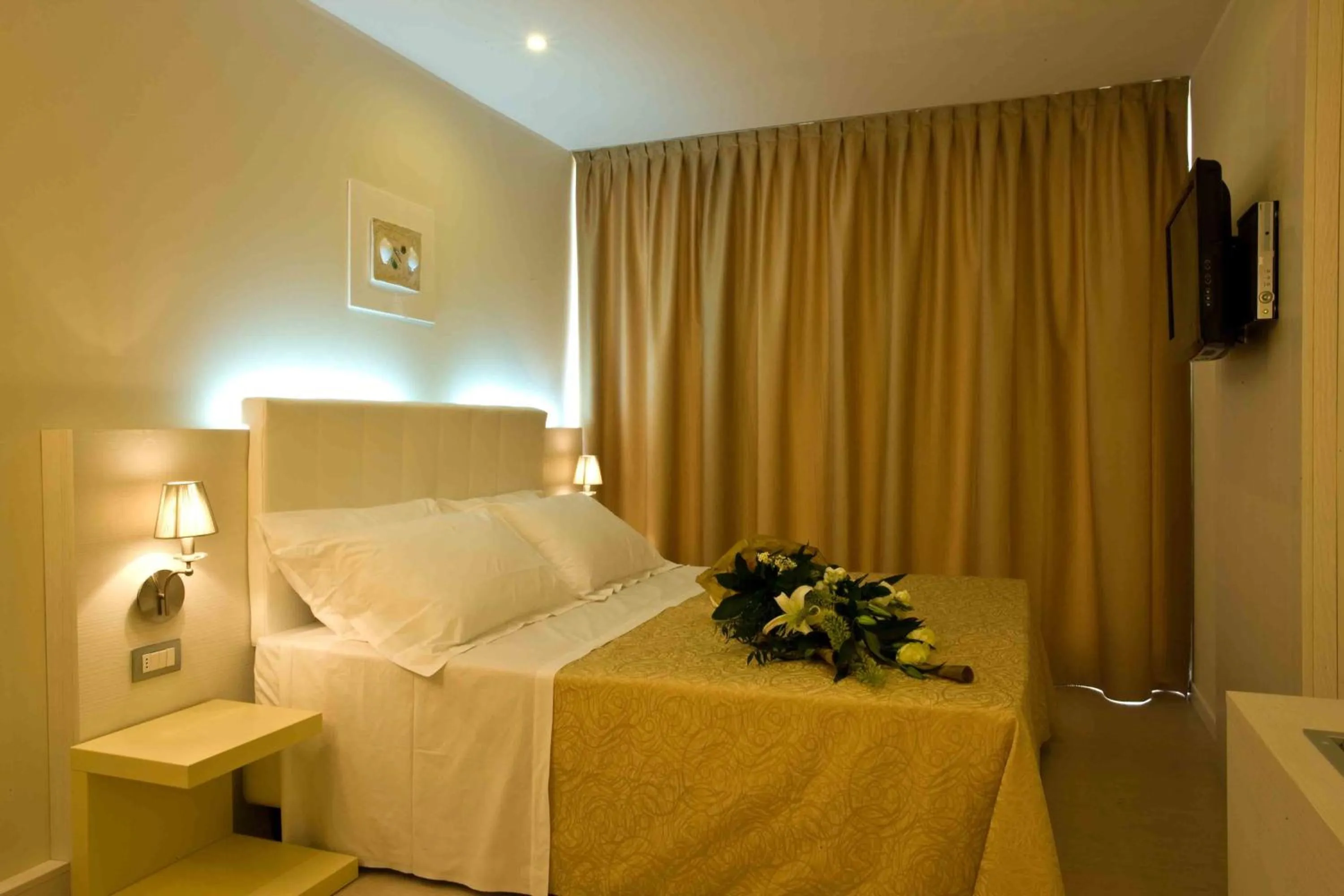 Bed in Ferretti Beach Hotel