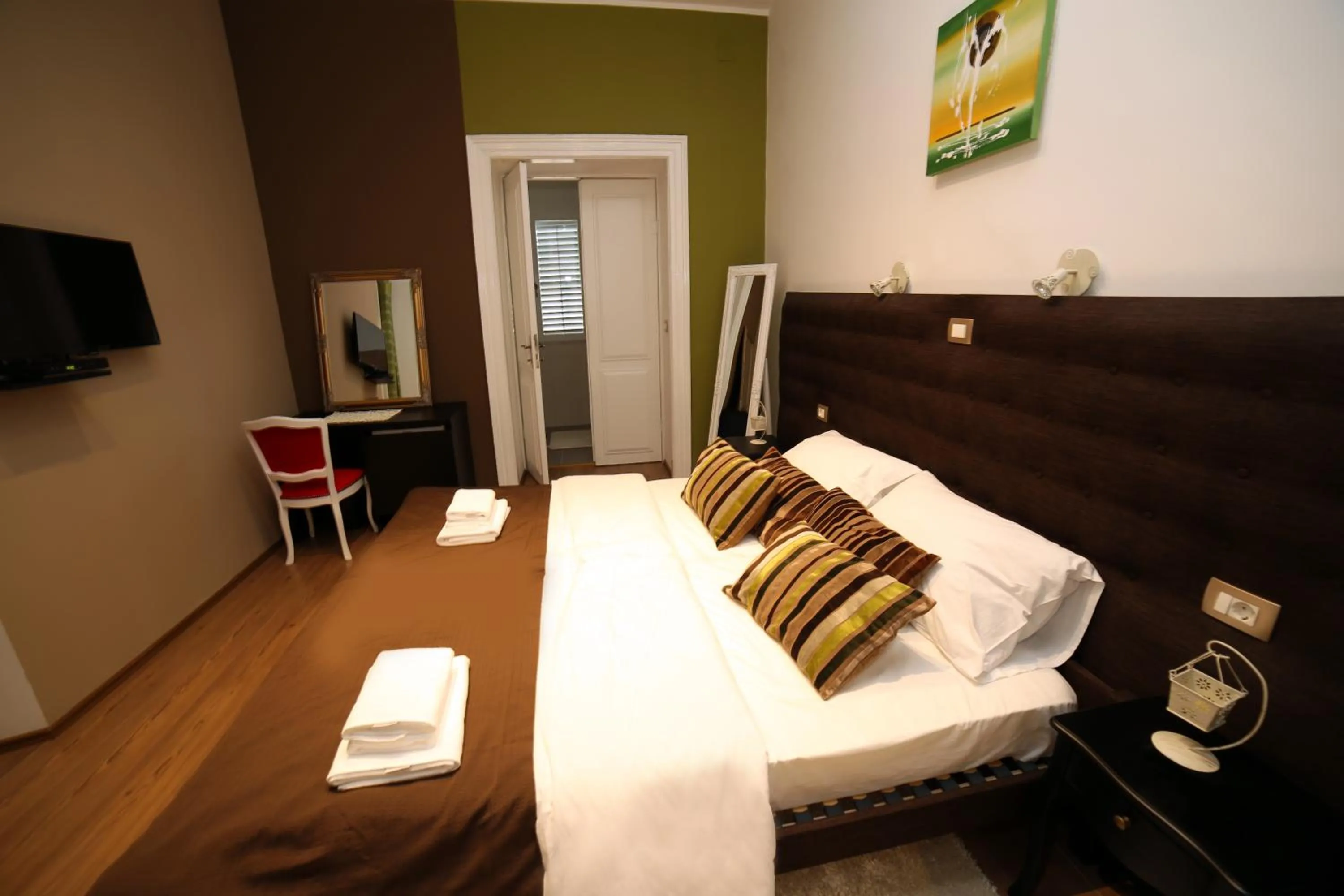 Bed in Pula Antic Rooms in Center