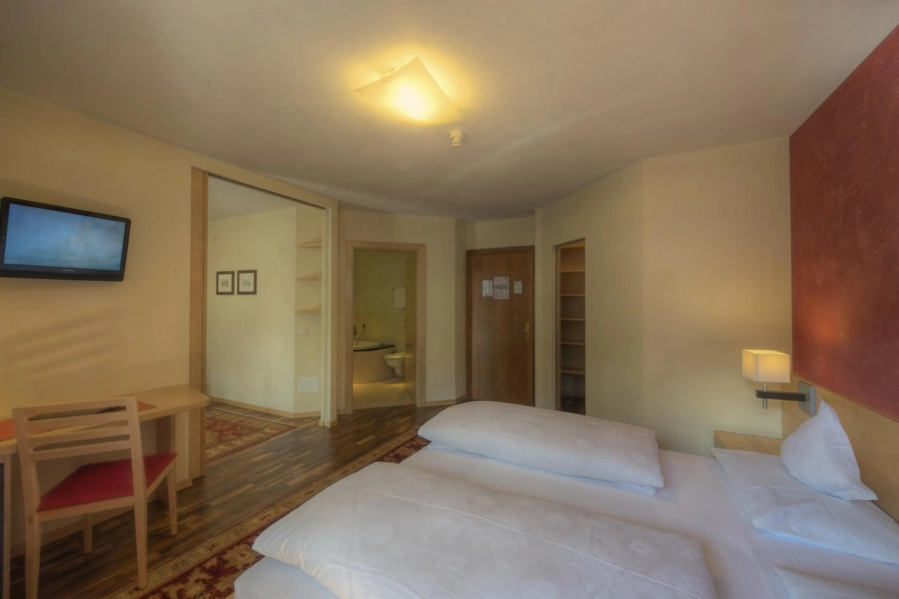 Photo of the whole room, Bed in Sporthotel Panorama