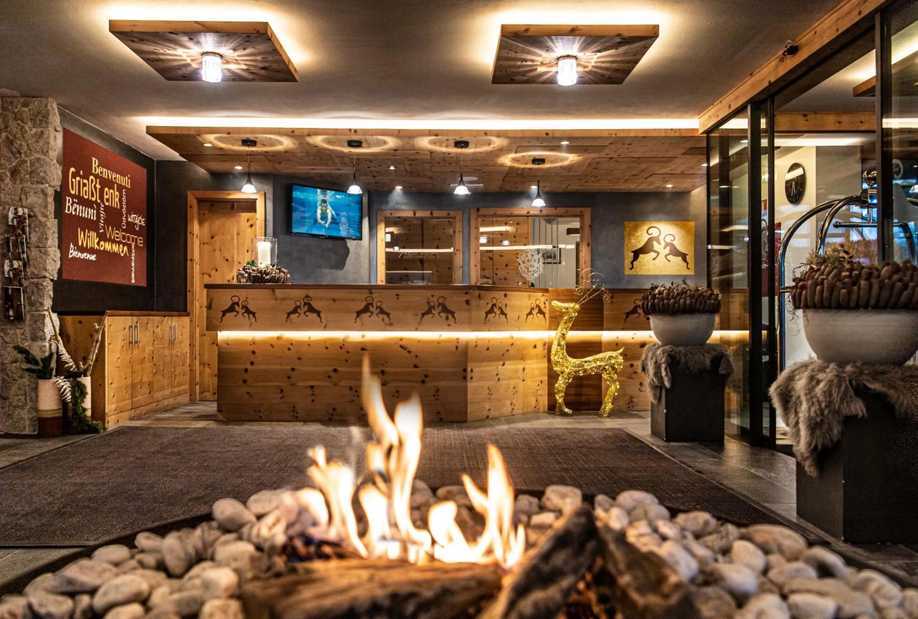 Lobby or reception in ABINEA Dolomiti Romantic SPA