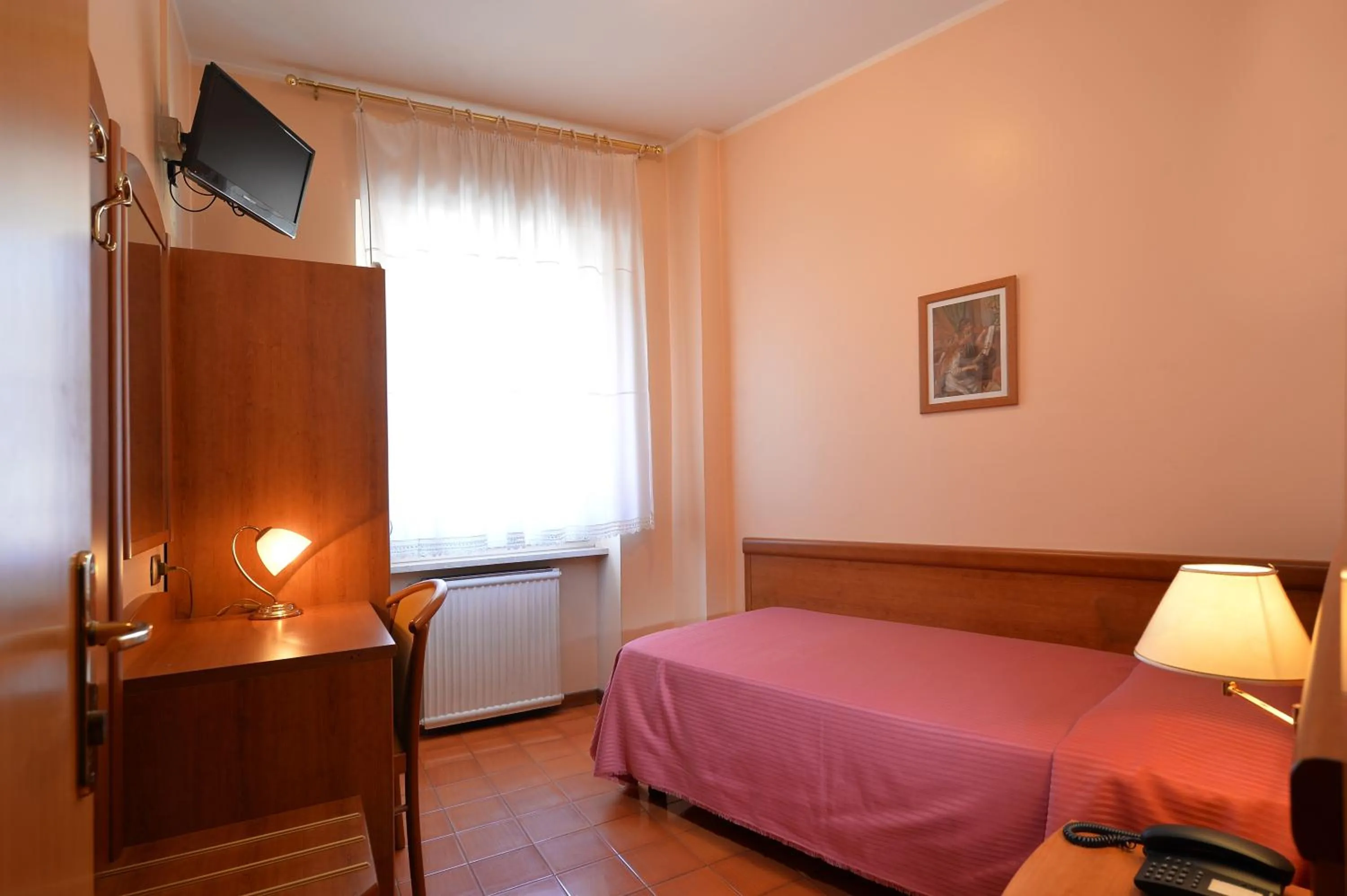 Photo of the whole room, Bed in Hotel Siena