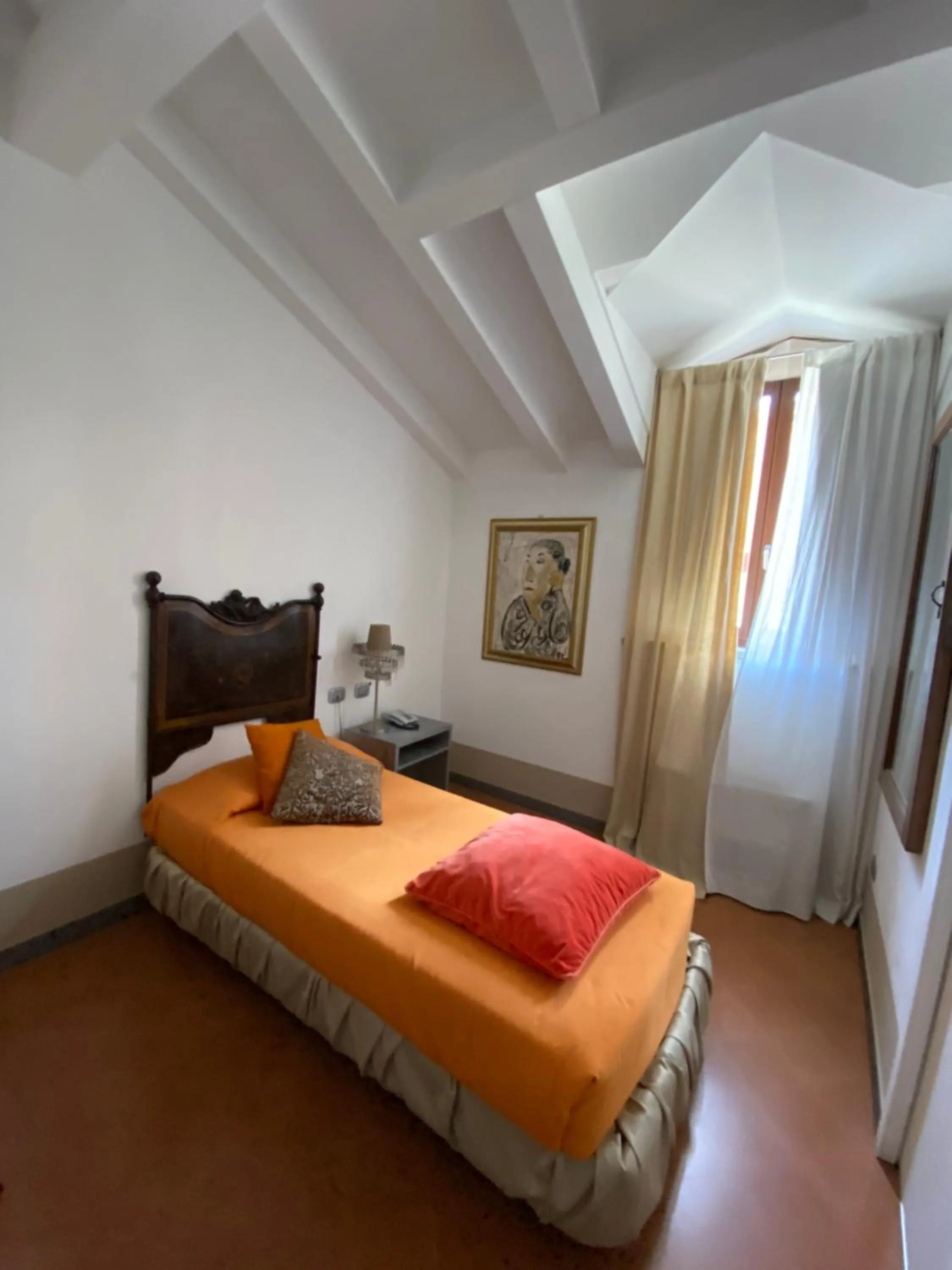 Bed in Art Hotel Al Fagiano