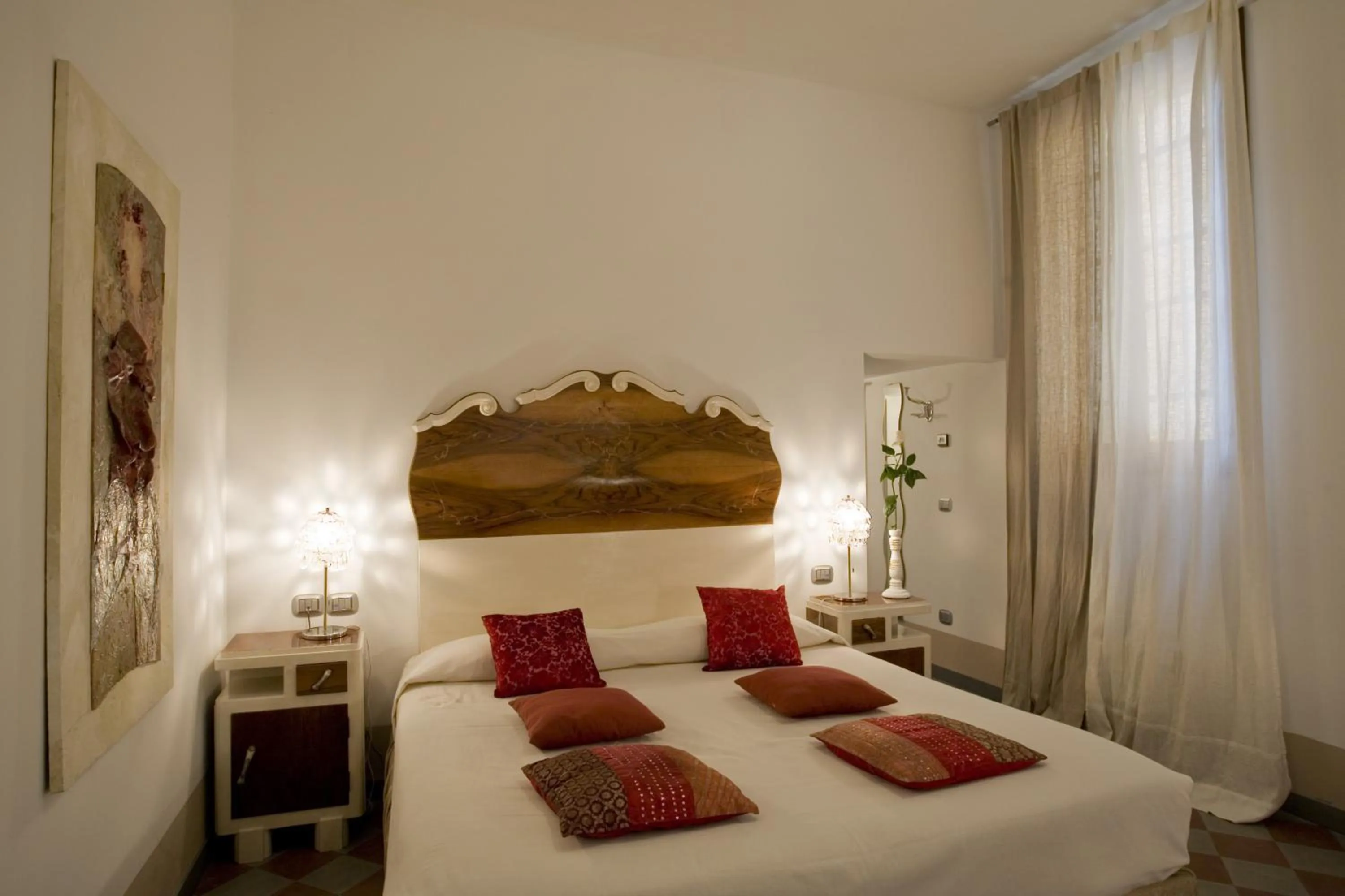 Bed in Art Hotel Al Fagiano