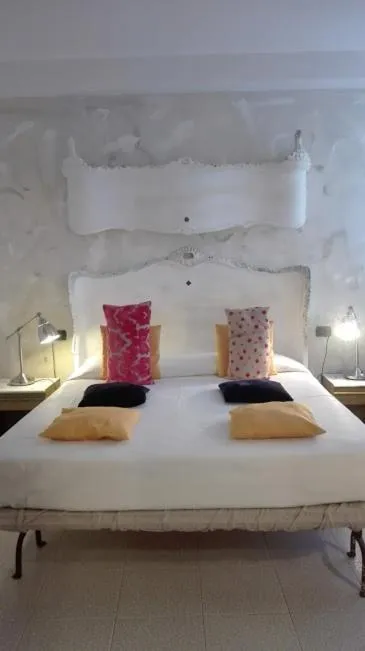 Bed in Art Hotel Al Fagiano