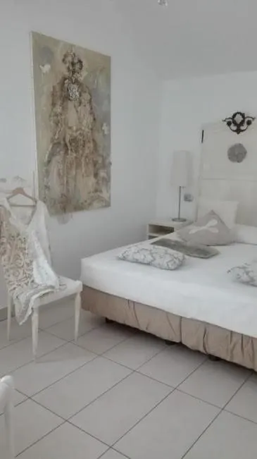 Bed in Art Hotel Al Fagiano