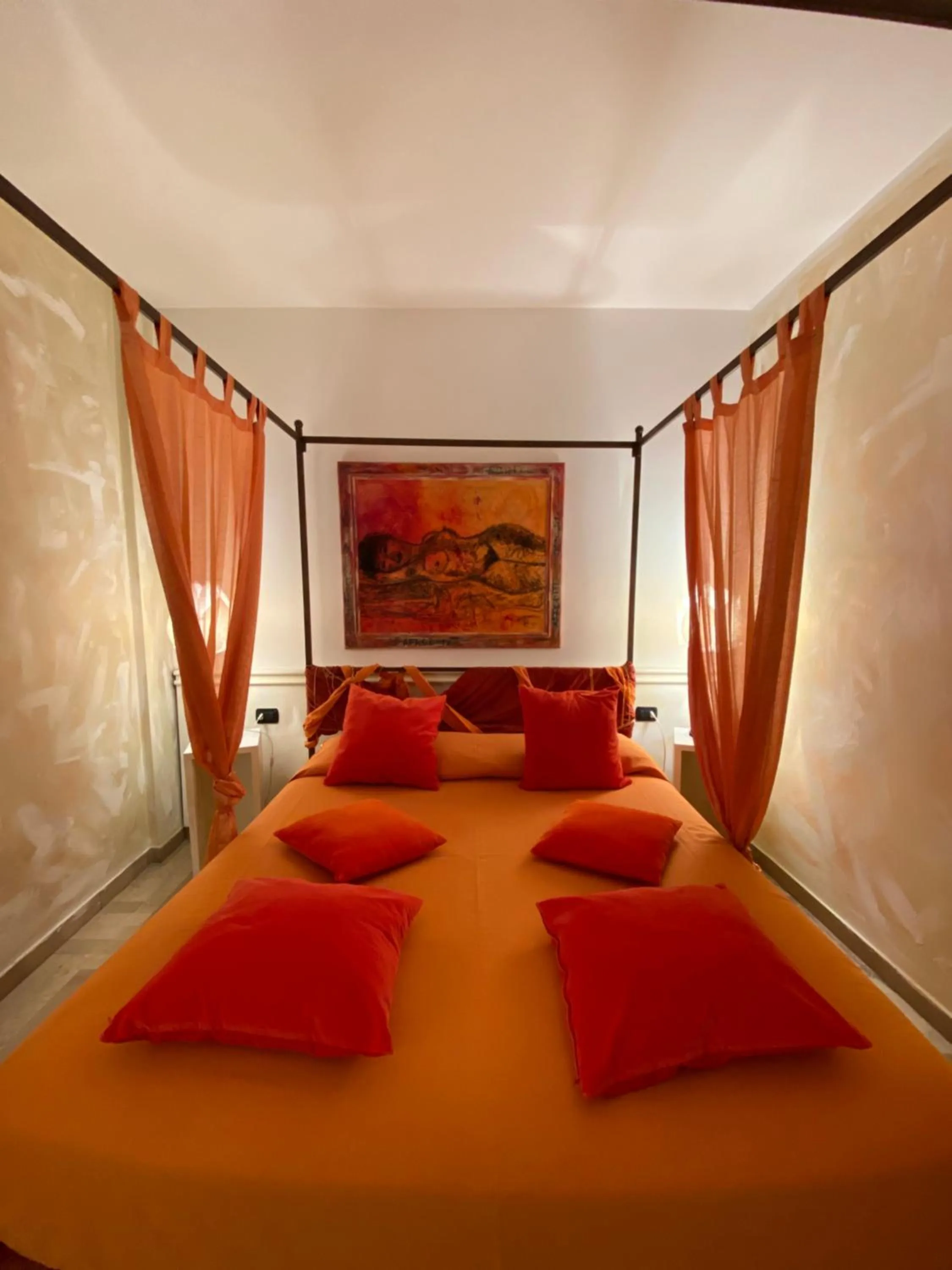 Bed in Art Hotel Al Fagiano