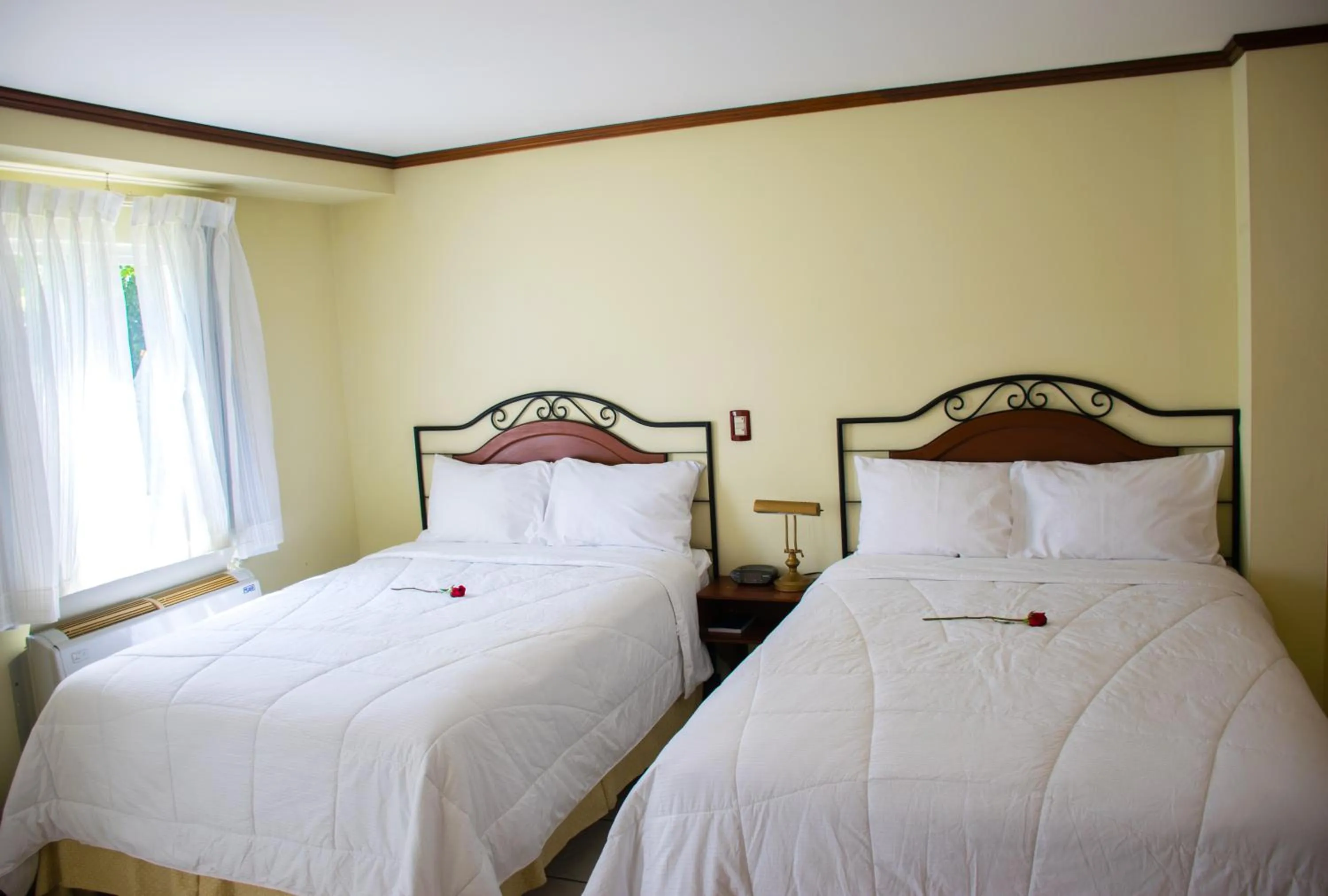 Bed in Hotel Gardenia Inn