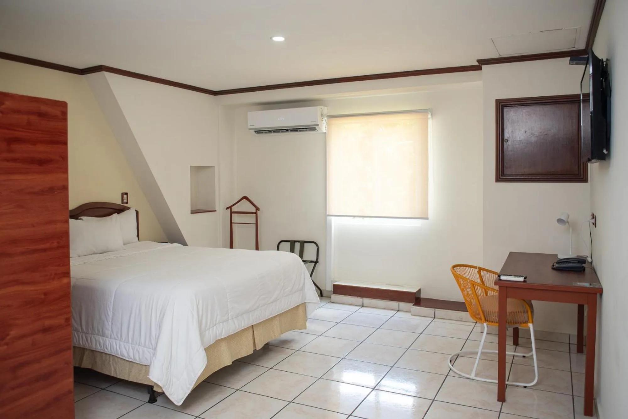 Bed in Hotel Gardenia Inn