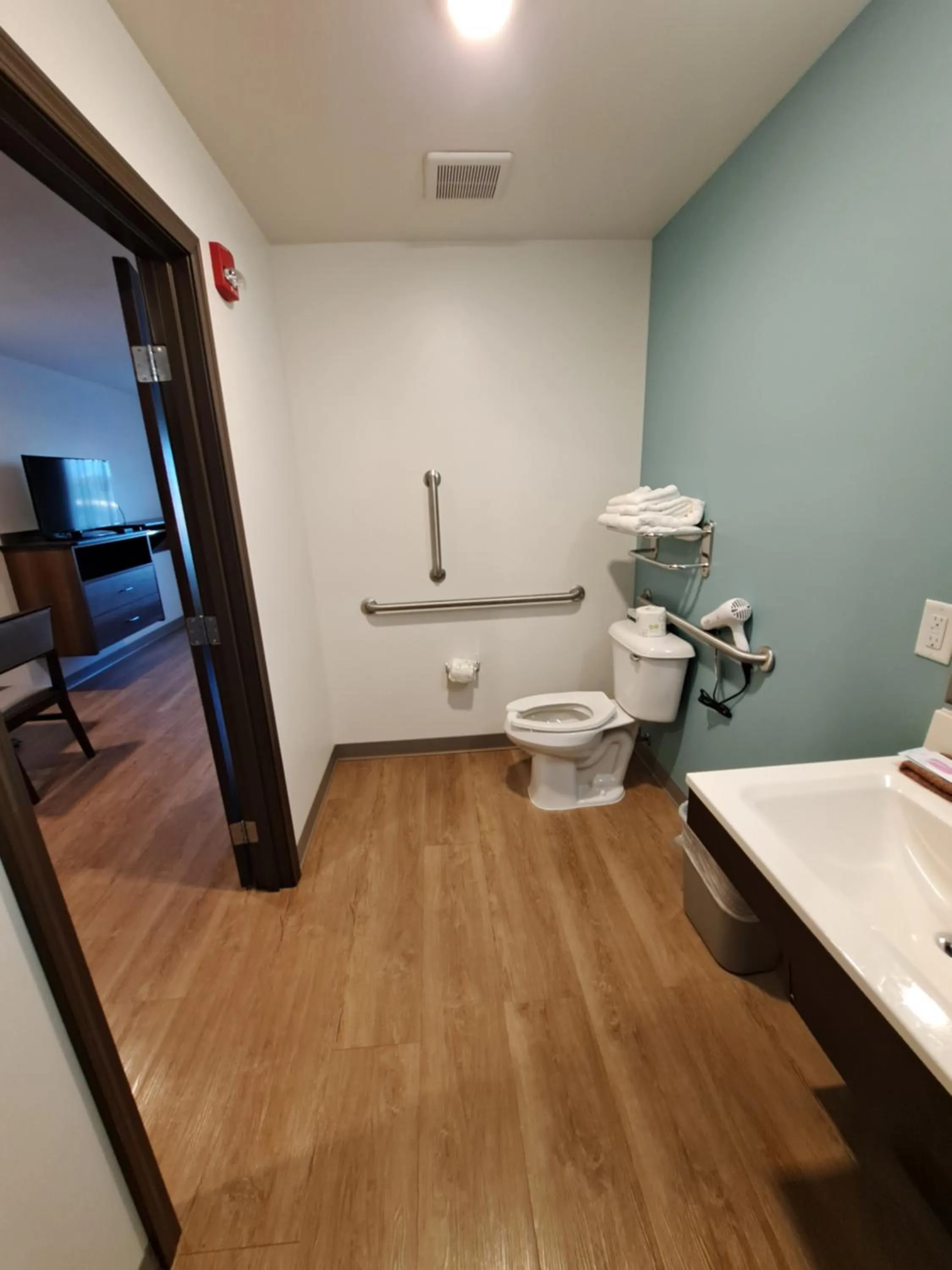 Bathroom in WoodSpring Suites Fargo North Near NDSU