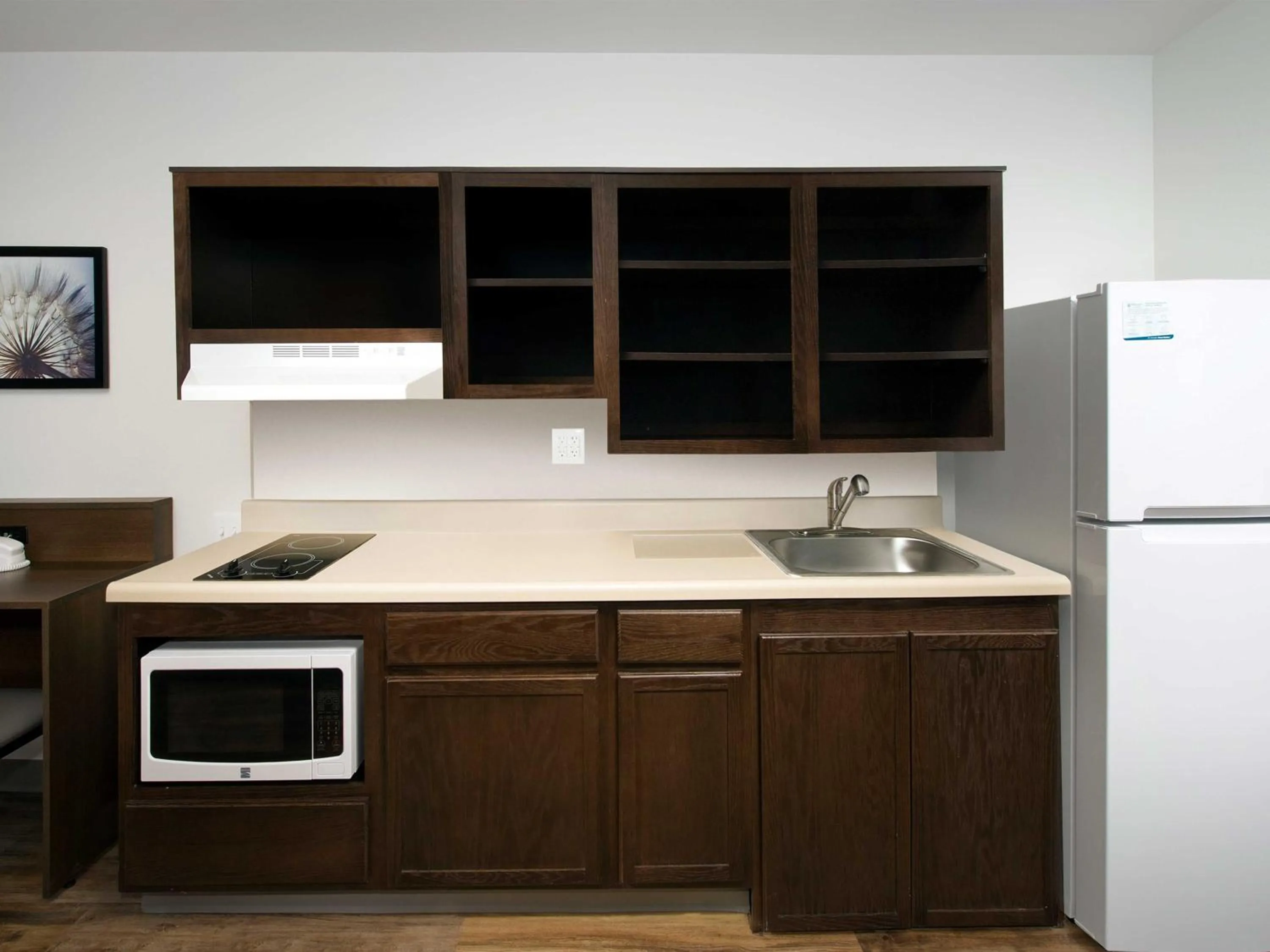 Kitchen or kitchenette in WoodSpring Suites Fargo North Near NDSU