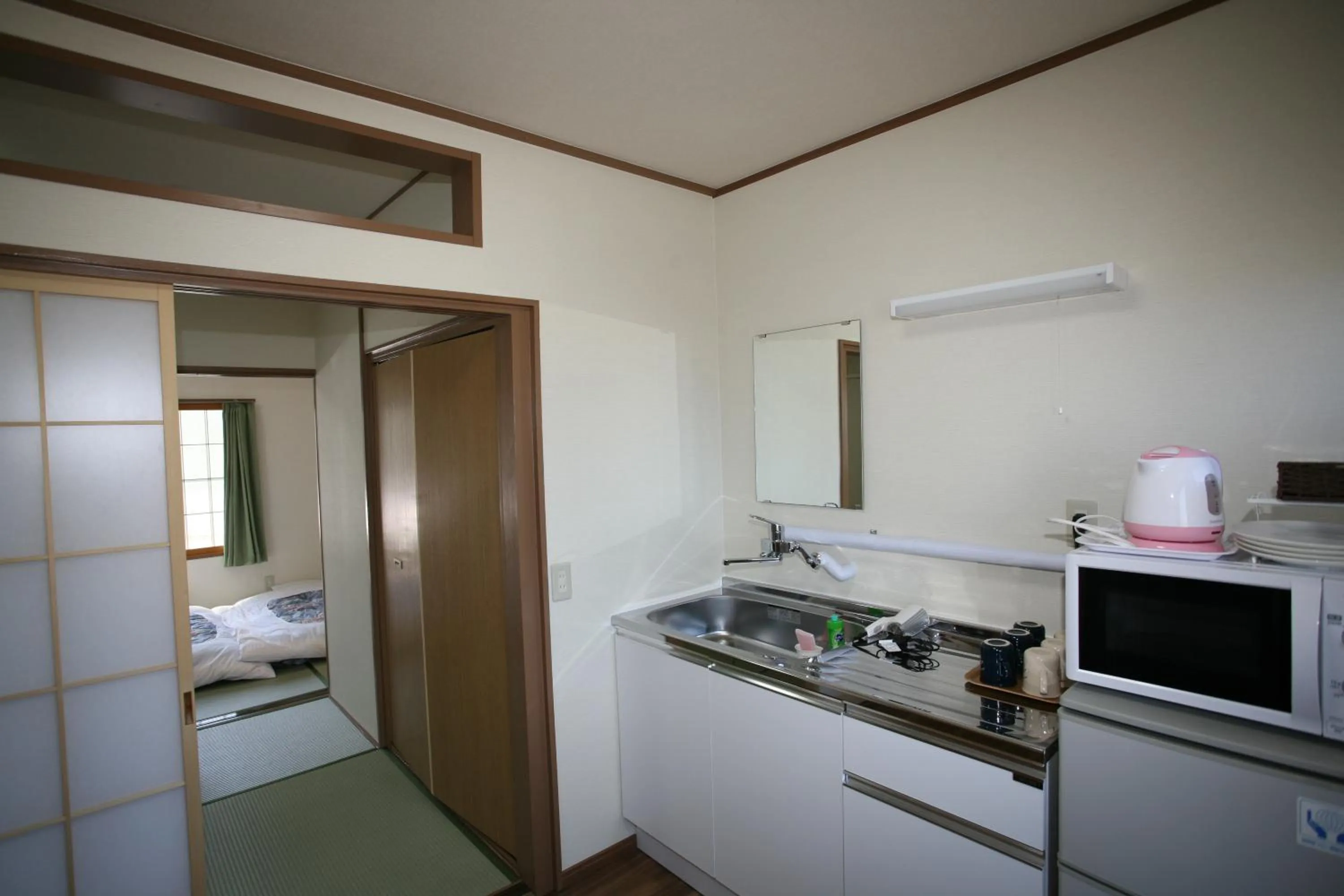 Kitchen or kitchenette, Bed in Fujiyama Base