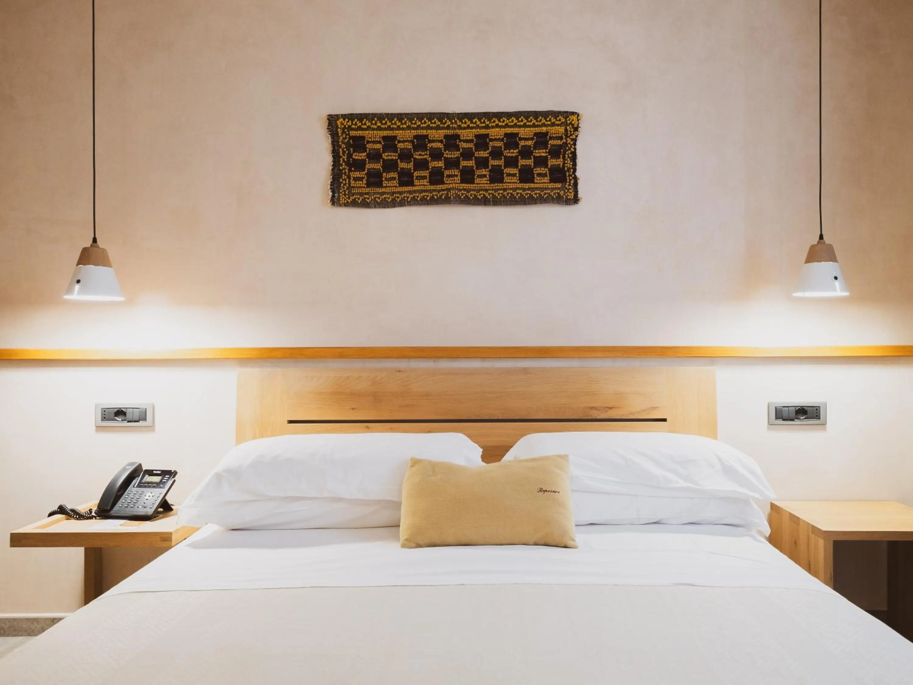 Bed in Tramas Hotel & Spa