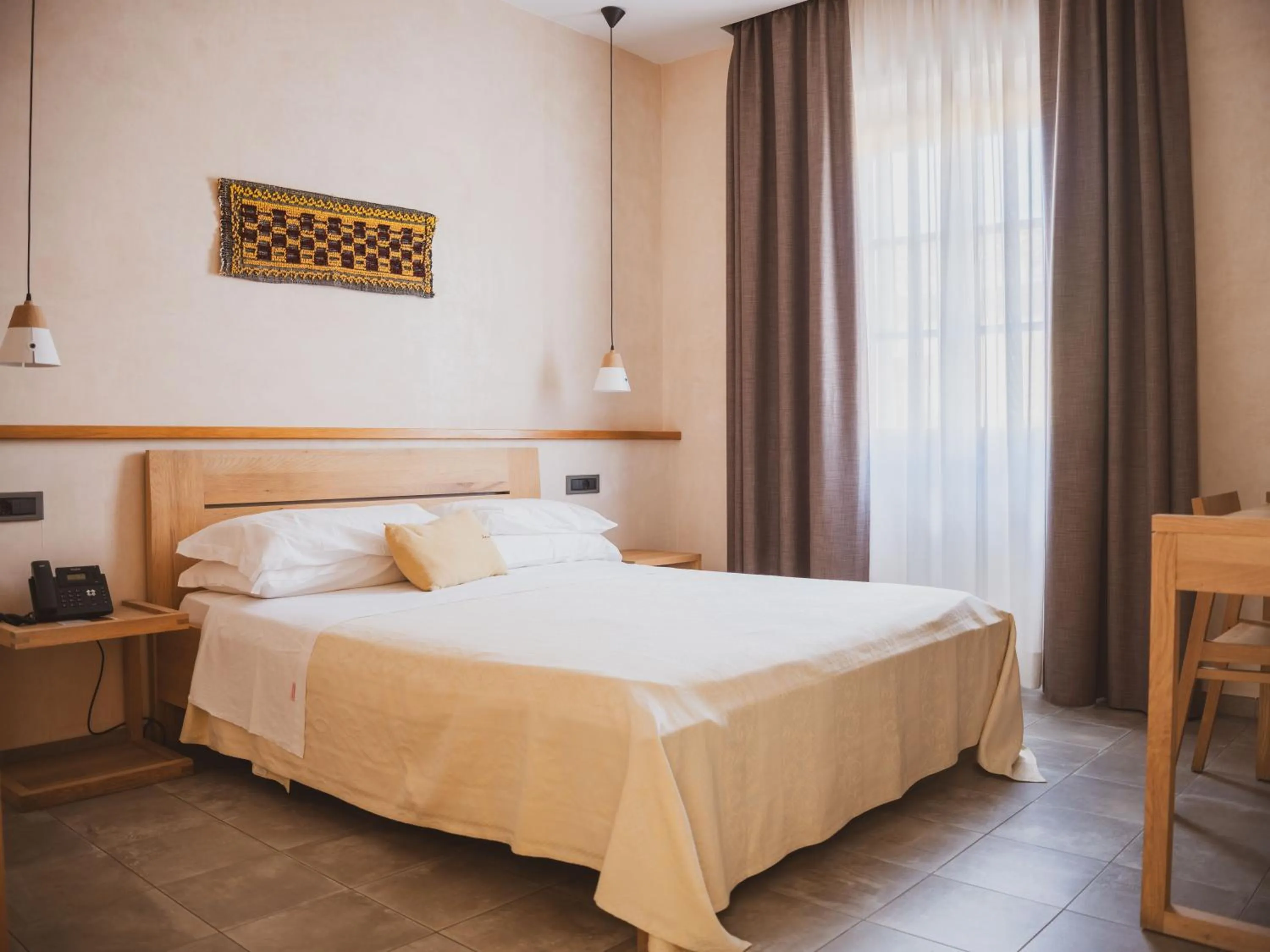 Bed in Tramas Hotel & Spa