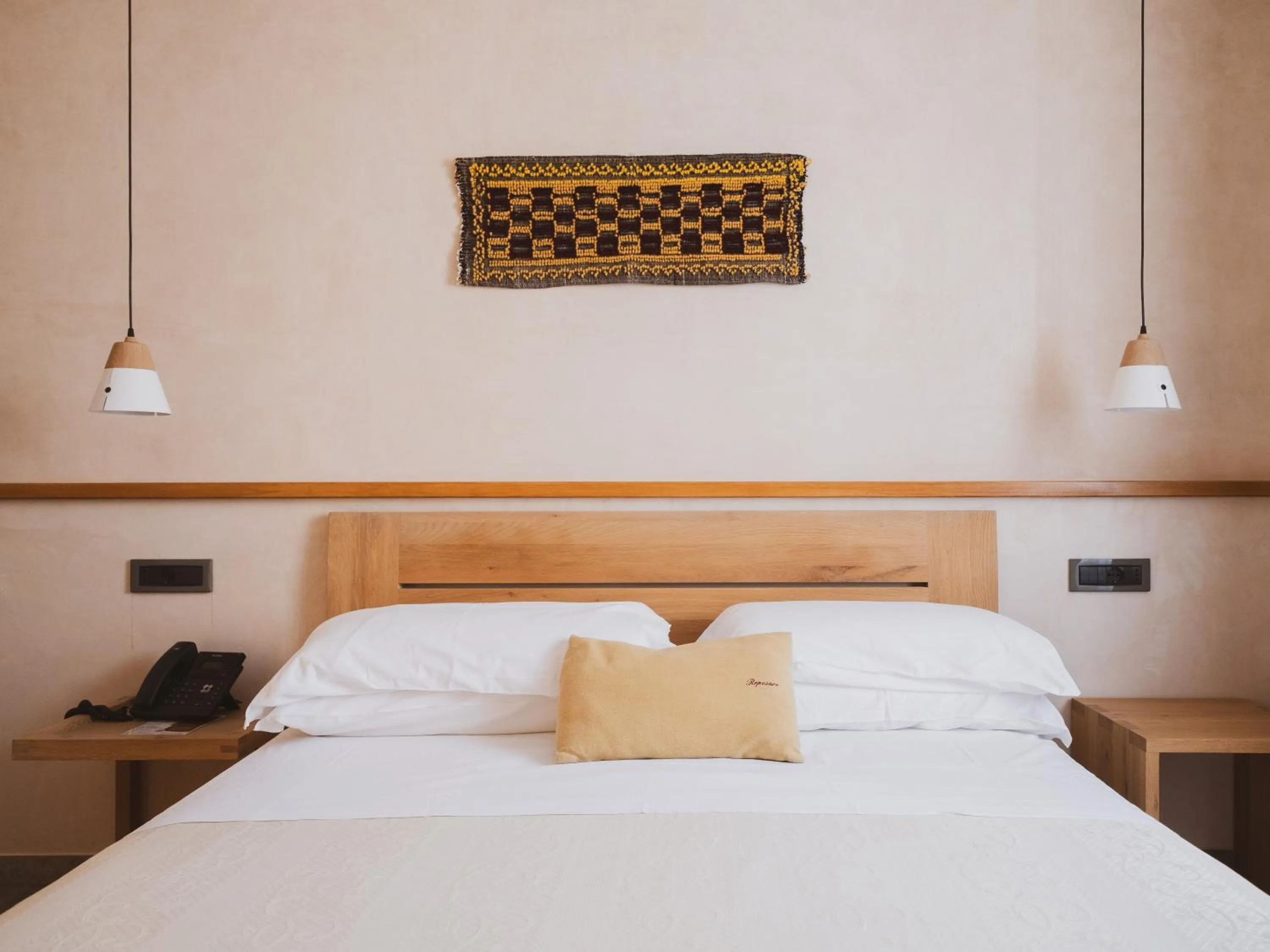 Bed in Tramas Hotel & Spa