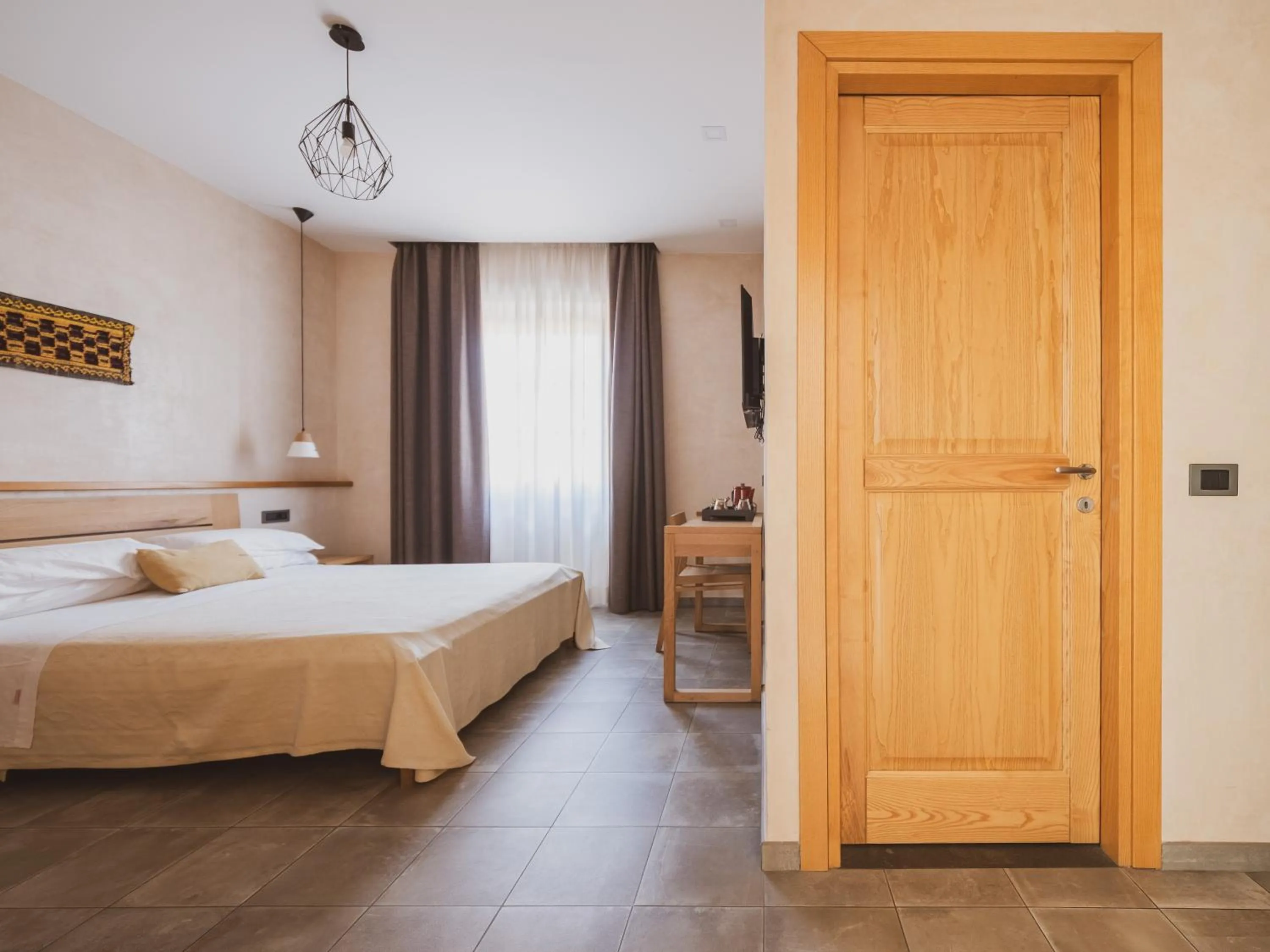 Bed in Tramas Hotel & Spa