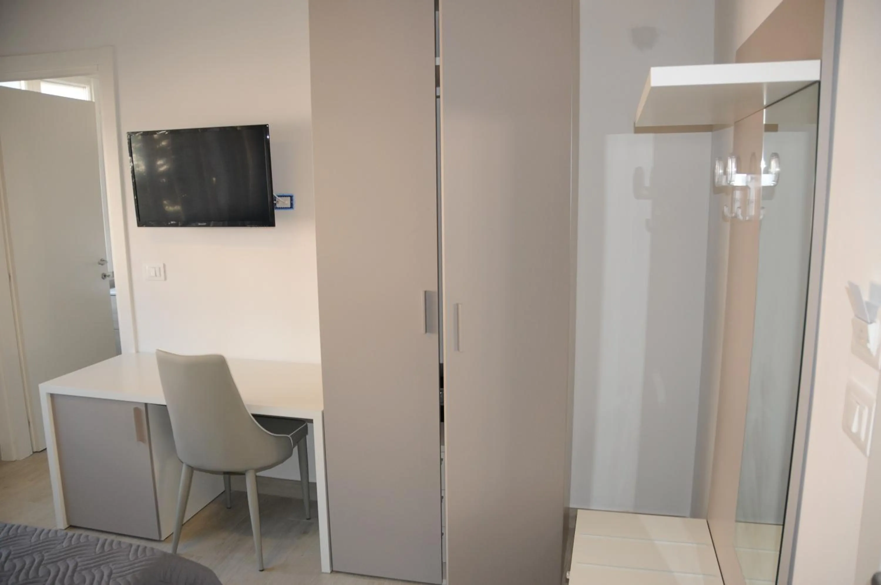 TV and multimedia in Affittacamere La Perla