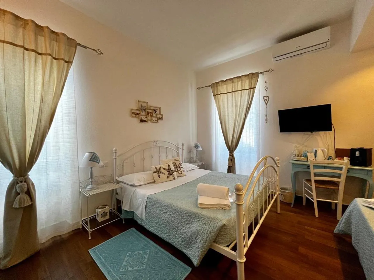 Bed in Palmasera Charming Rooms