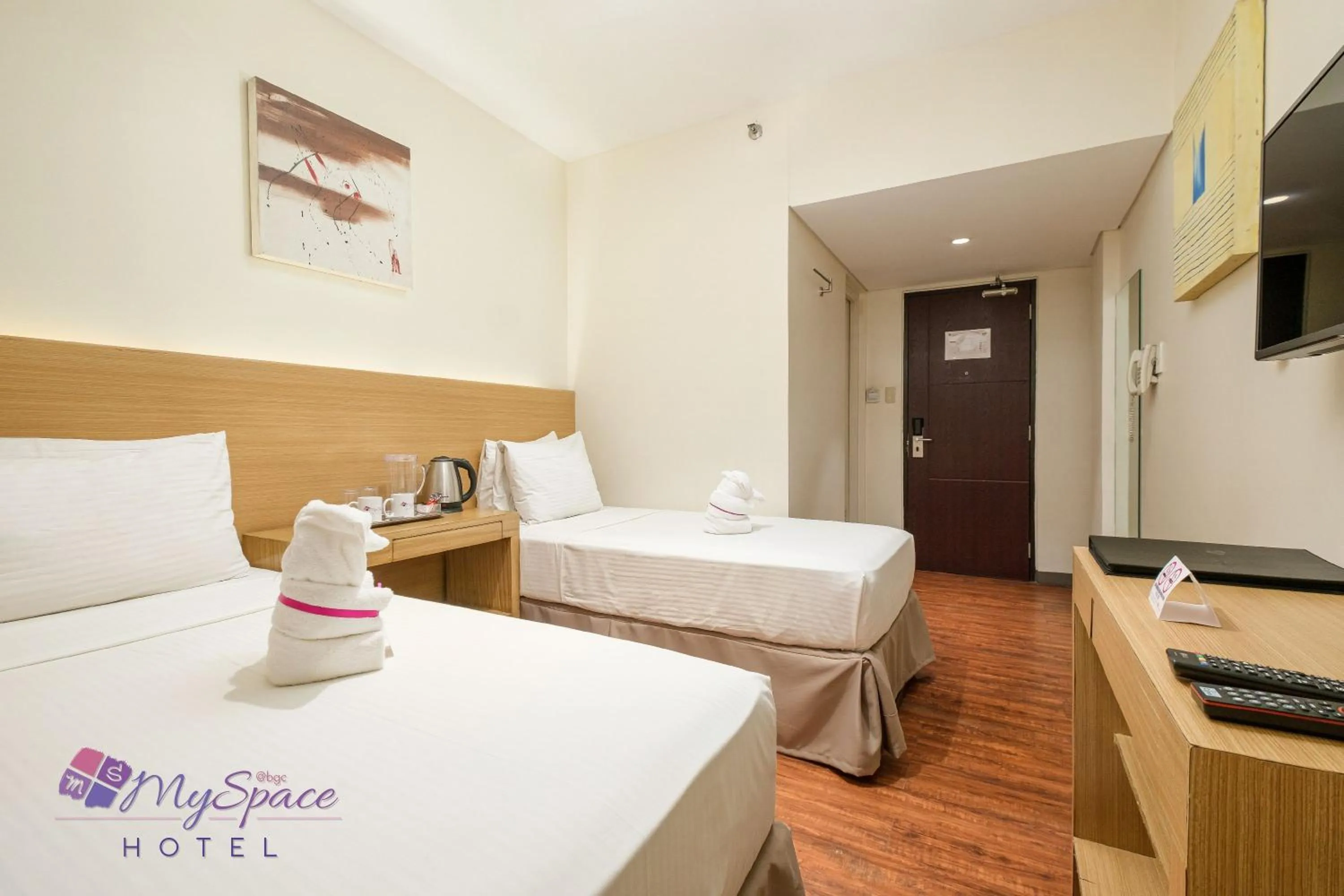 Photo of the whole room, Bed in MySpace Hotel @BGC