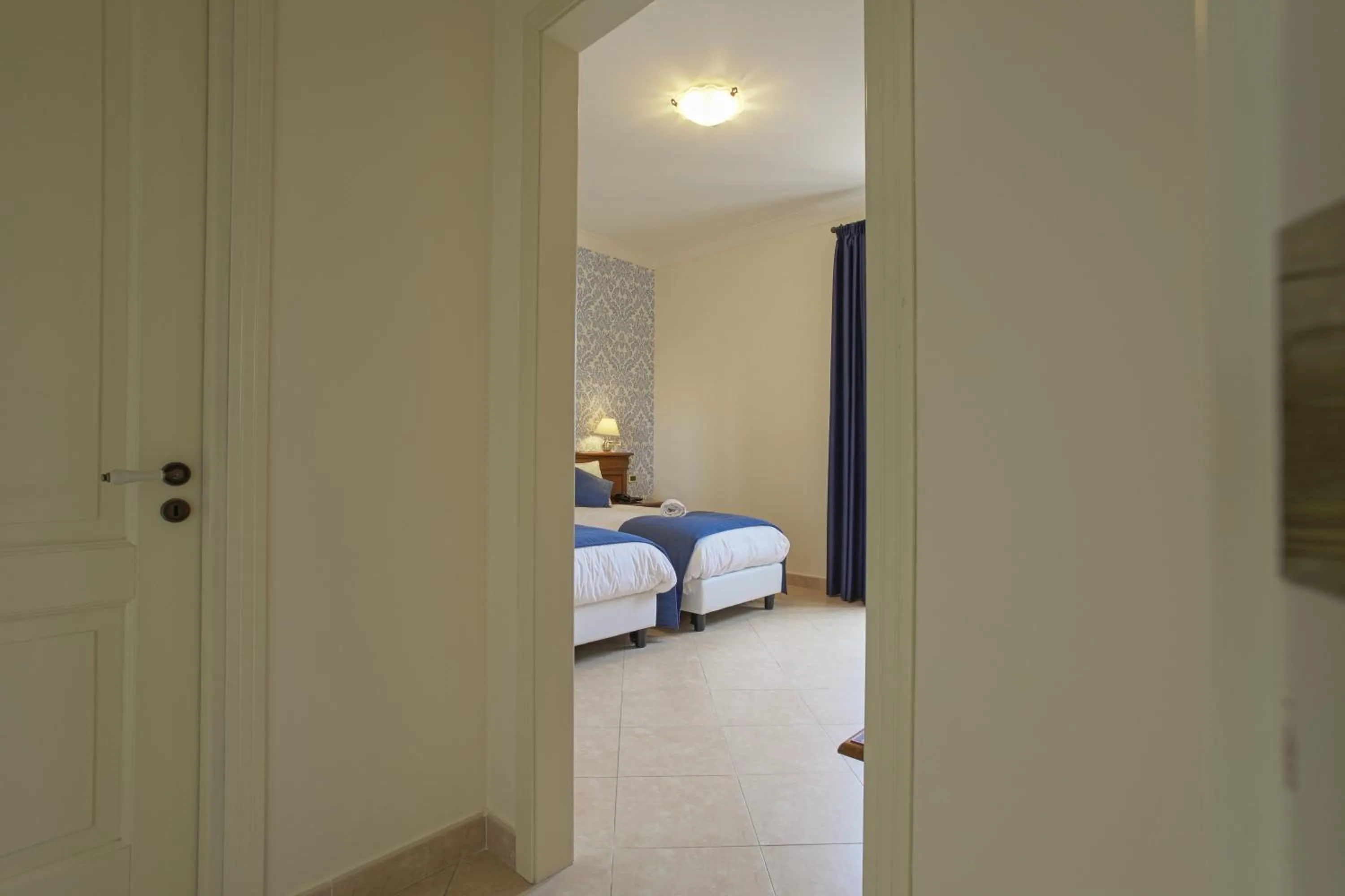Photo of the whole room, Bed in Relais Villa Giuliana