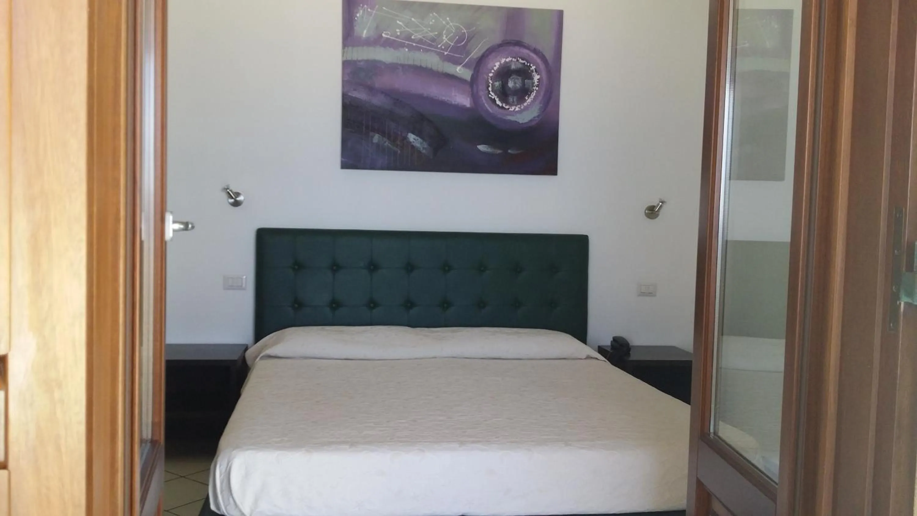 Bed in La Zagara Hotel