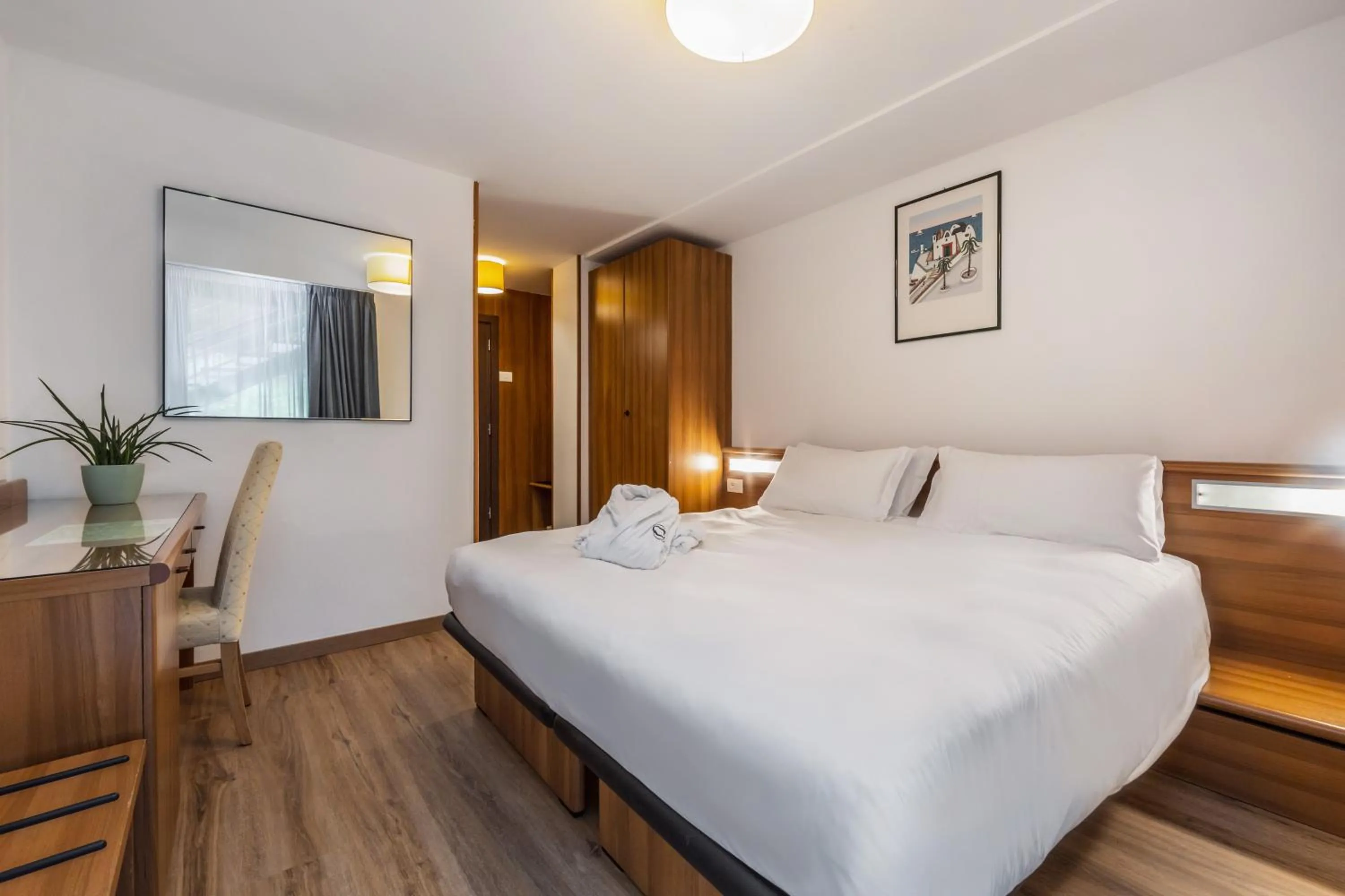 Bedroom, Bed in Luna Wellness Hotel